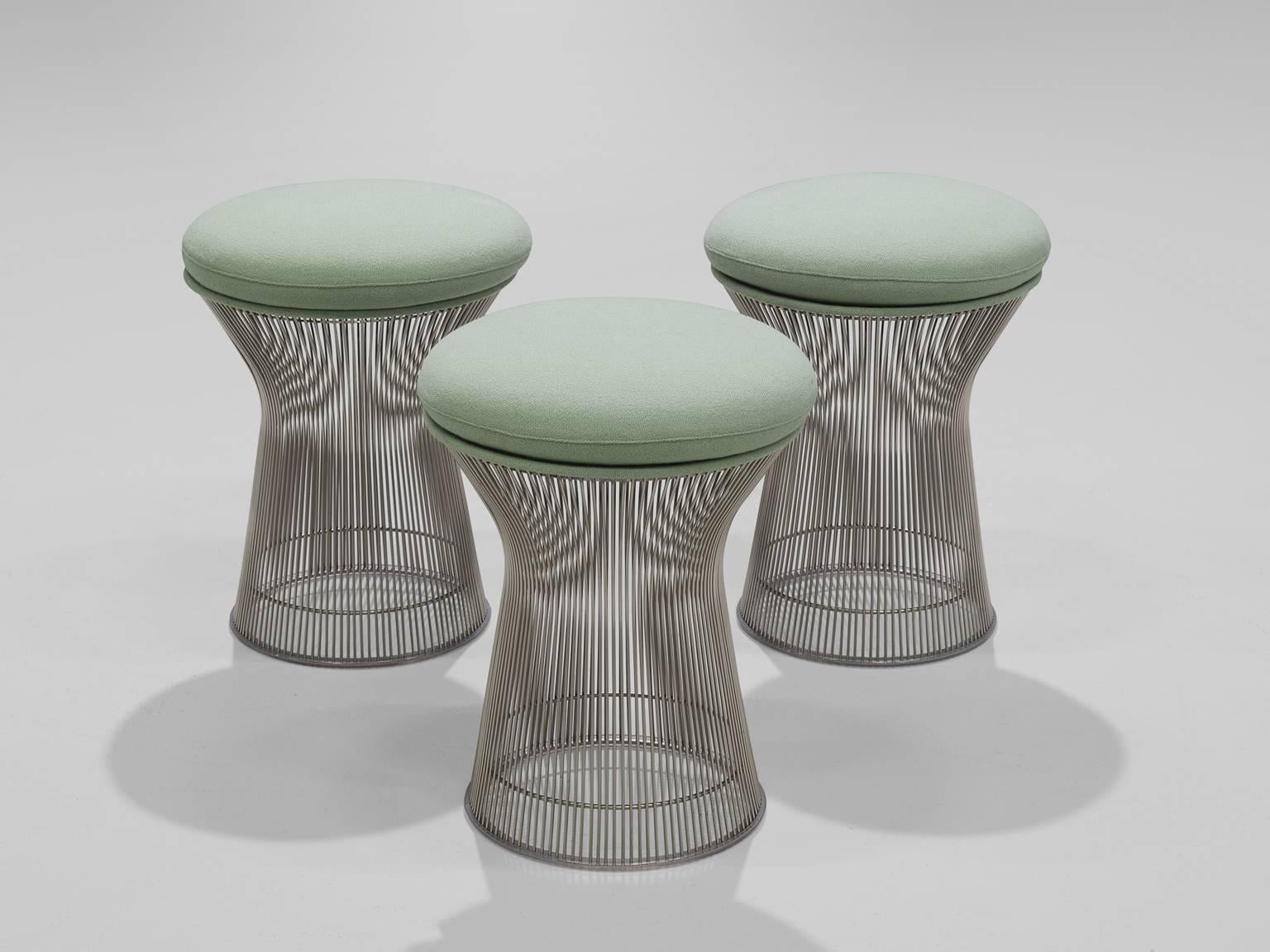 Warren Platner, three stools in metal and fabric, 1966, United States. 

This iconic mint green set of stools by Warren Platner (1919-2006) is created by welding curved steel rods to circular and semi-circular frames, simultaneously serving as