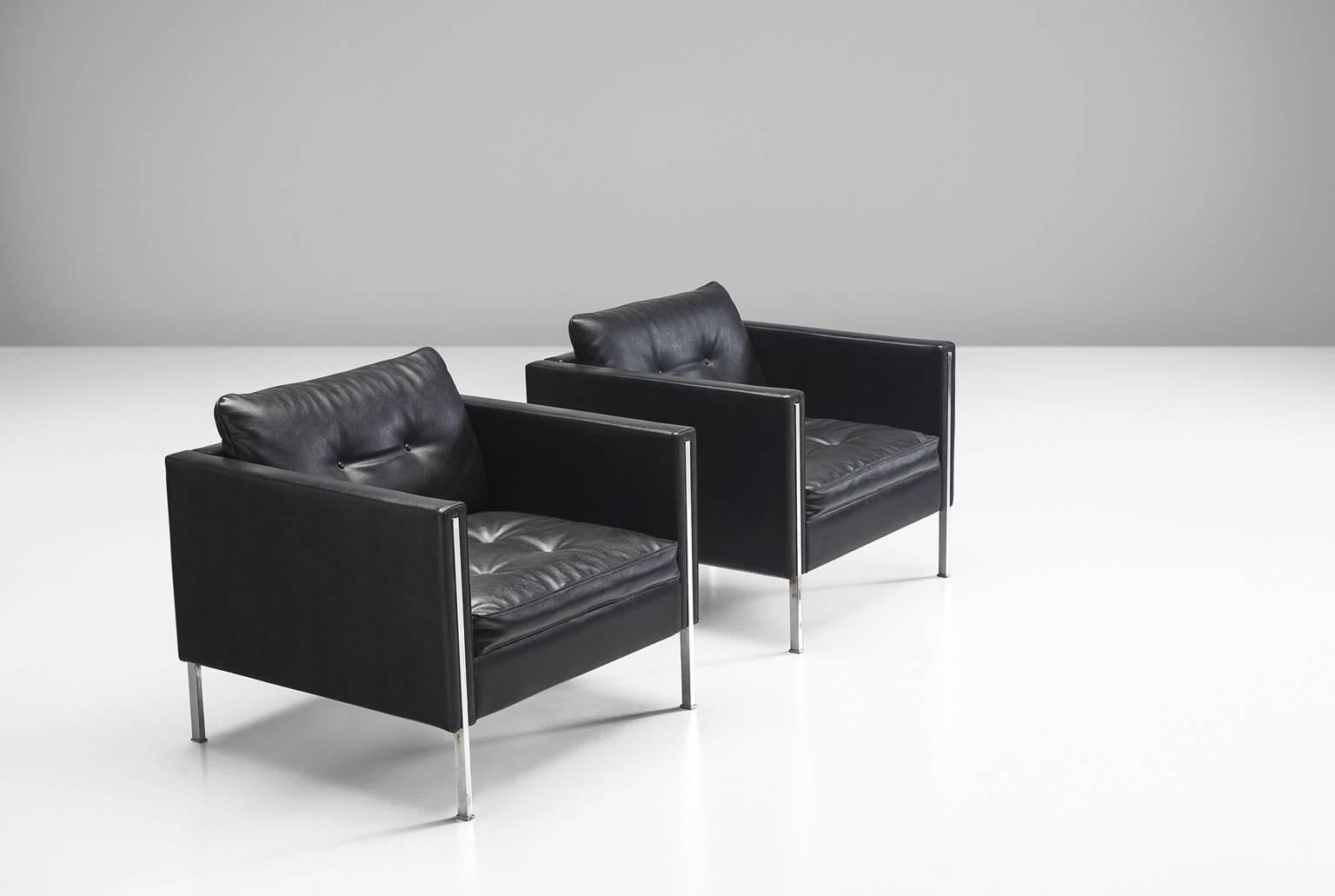 Chairs model '442/3', in black faux leather and steel by Pierre Paulin for Artifort, the Netherlands 1962. 

These tufted comfortable chairs shows elegant steel details. The combination of steel and the black faux leather upholstery give these
