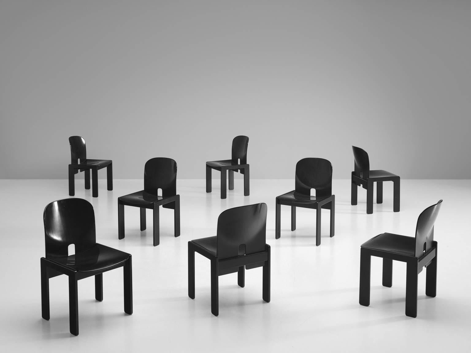 Set of eight chairs model 121, in black painted wood, by Afra & Tobia Scarpa for Cassina, Italy, 1965.
 
Set of eight chairs by Italian designer couple Tobia and Afra Scarpa. These chairs have a cubic and basic appearance. The base consist of