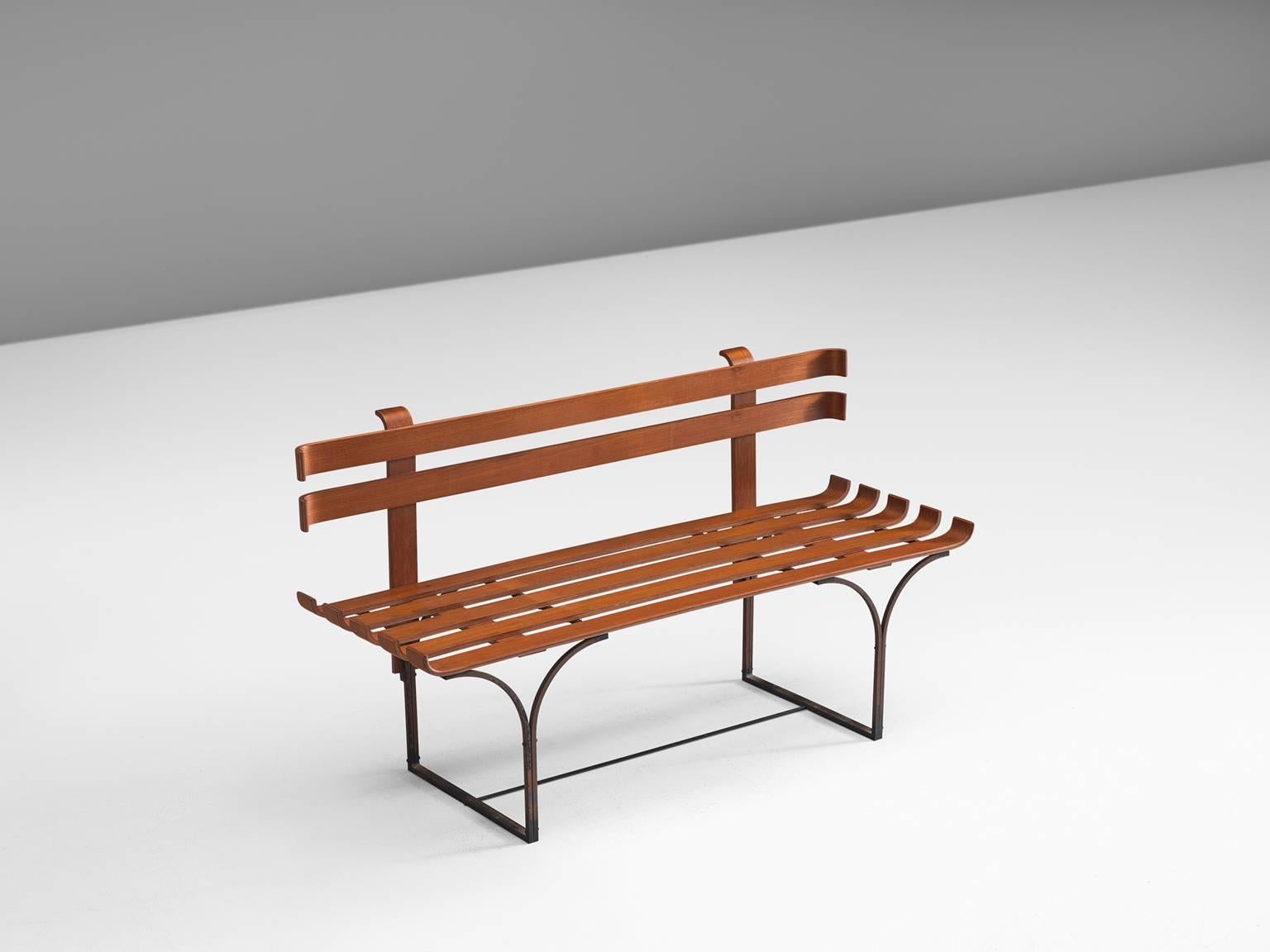 Plywood bench on metal base, Italy, 1950s

The bent plywood bench represents characteristic Italian design elements such as the playful lines of the bent frame and the typical basic design of the plywood. The overall effect of the bench is decidedly