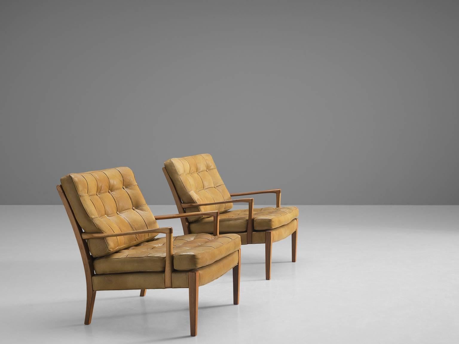Mid-Century Modern Two Easy Chairs in Cognac Leather and Teak by Arne Norell, Sweden, 1960