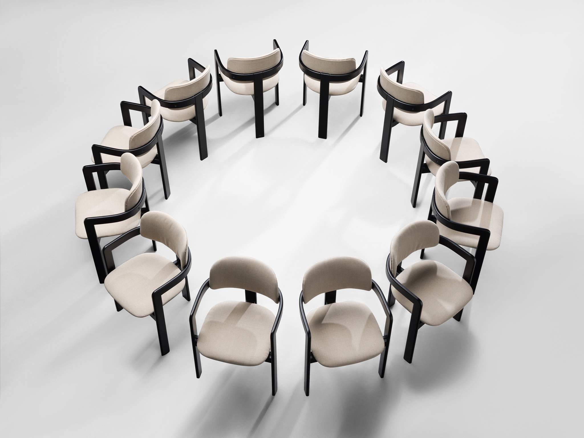 Set of 12 chairs, fabric, wood, Italy, 1960s.

This set of twelve armchairs is executed in high gloss black lacquered wood and grey muted upholstery. This is a comfortable design with simplistic and strong lines and proportions. The chairs have