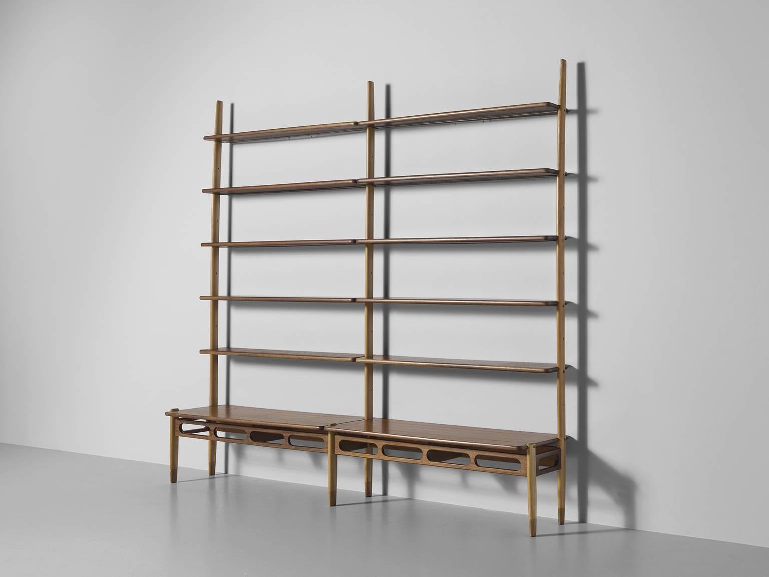 Shelving unit by William Watting, walnut, The Netherlands, 1950s

This slender, elegant wall unit features two sections that each consist of a wide base above which five further shelves are displayed. The units main feature is openness, not only
