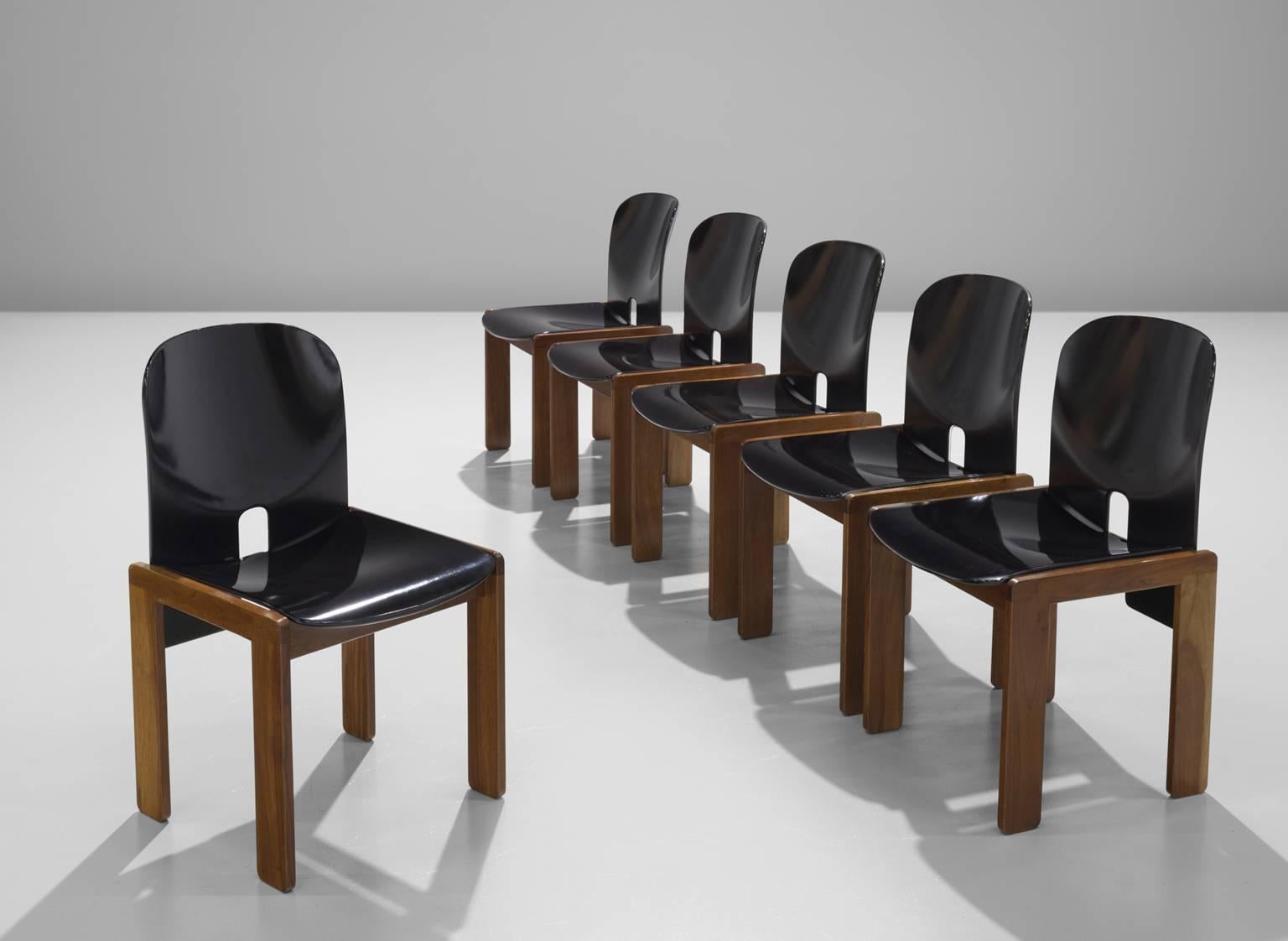 Set of eight chairs model 121, in wood , by Afra & Tobia Scarpa for Cassina, Italy, 1965.
 
Set of six chairs by Italian designer couple Tobia and Afra Scarpa. These chairs have a cubic and architectural appearance. The base consist of four