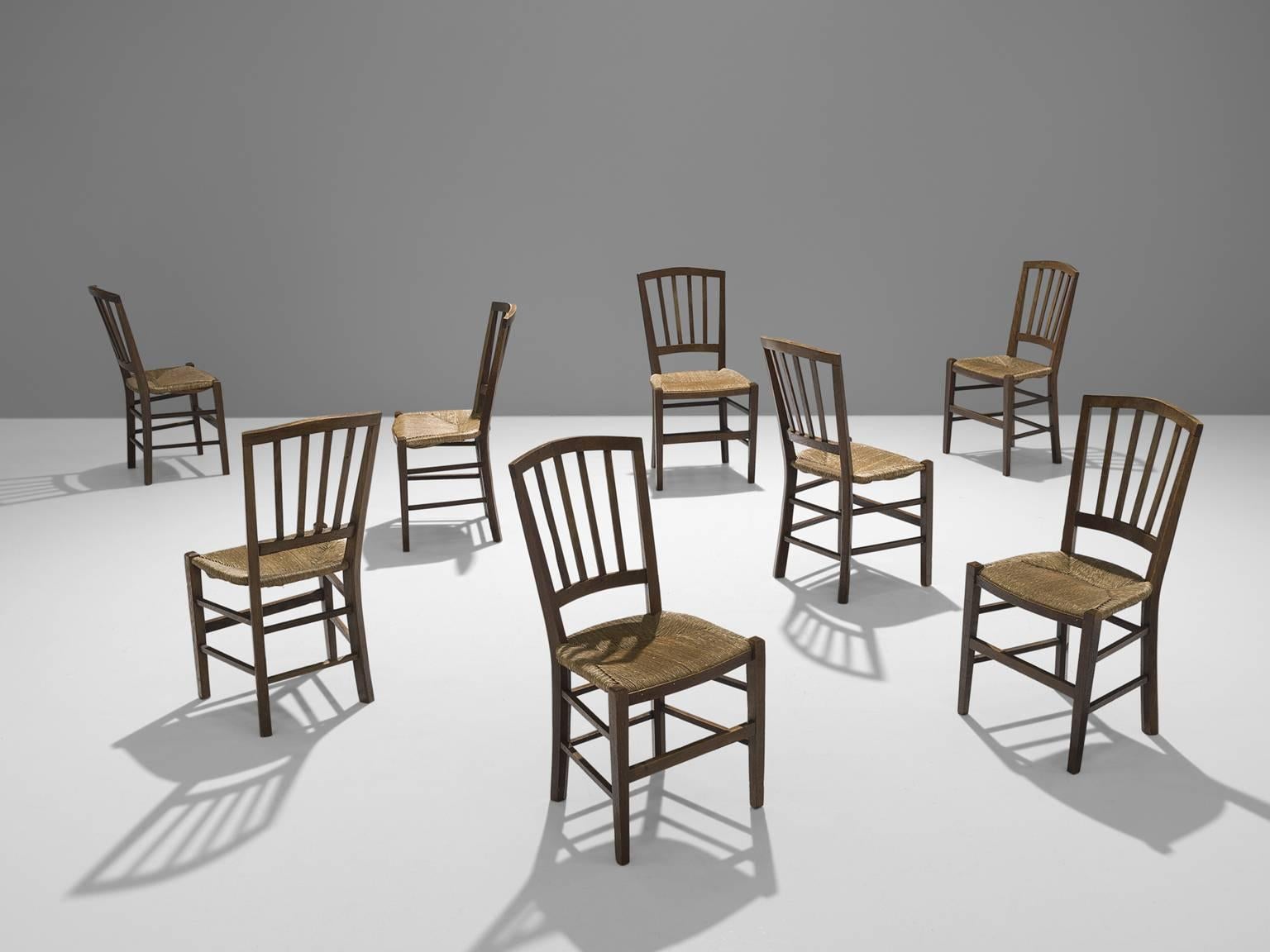 Large set of chairs, oak and rope, The Netherlands, 1960.

These eight stately chairs are executed in rope and patinated oak. The chairs have a solid and geometric backrest. The chairs are both functional and clear in their design. The design is