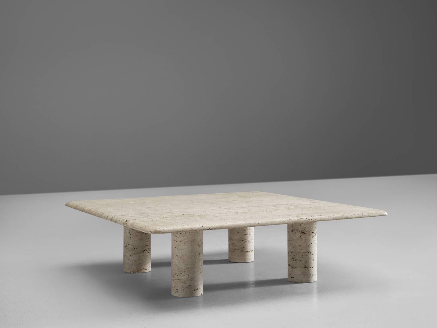 Coffee table in travertine, by Angelo Mangiarotti for Up&Up, Italy, 1970s.

This large sculptural table by Angelo Mangiarotti is a skillful example of postmodern design (we also have a smaller version). The cocktail table is executed in travertin.