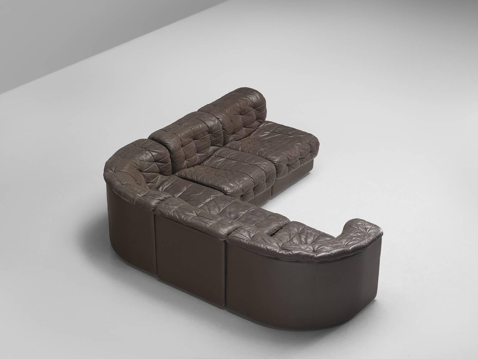 Sofa, DS11 sofa, dark brown patinated leather, 1970s. 

This comfortable leather sofa is manufactured by De Sede in Switzerland. Sectional sofa by the Swiss quality manufacturer De Sede. This sofa consists of five elements. The cushions are