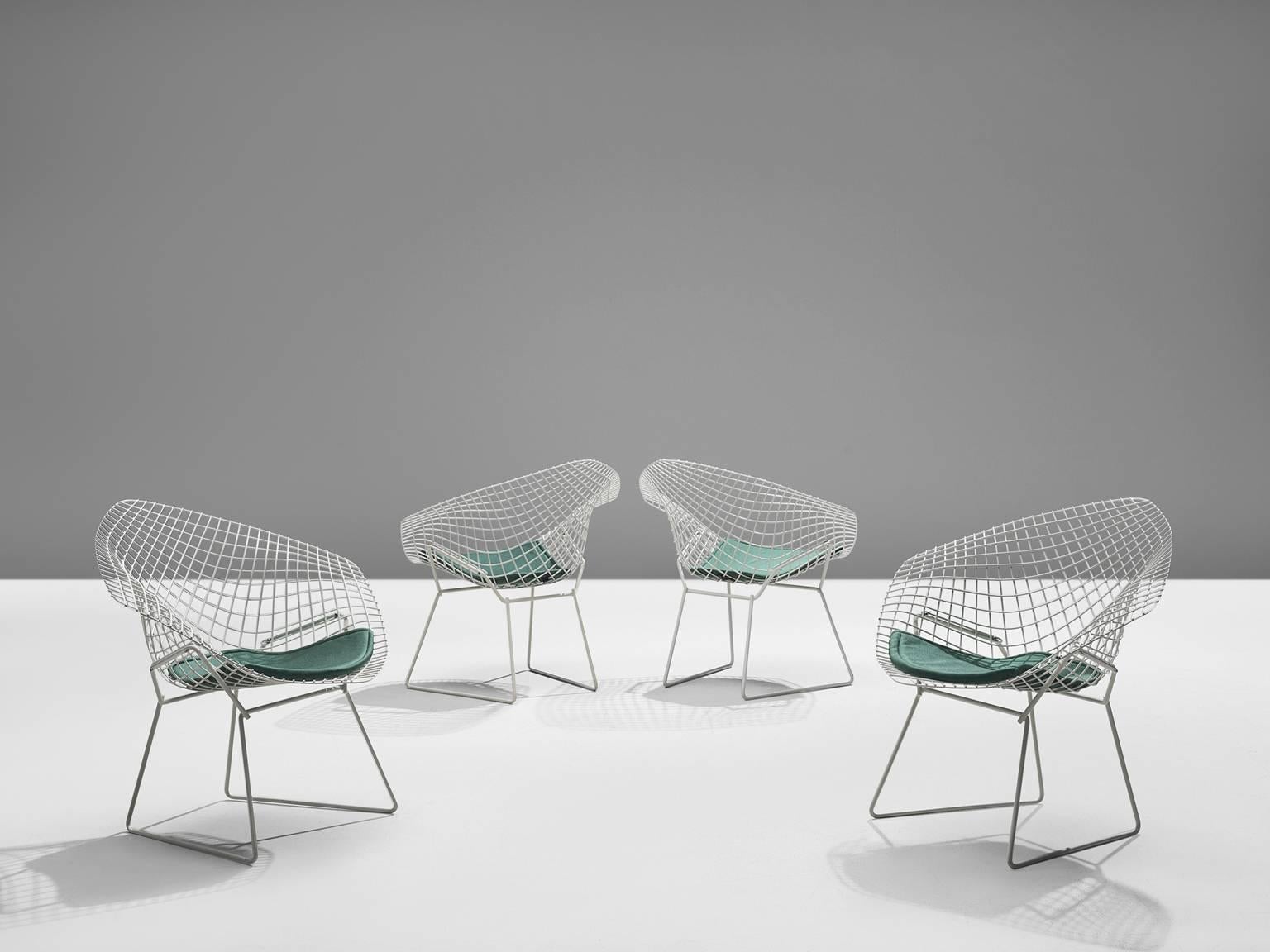 Set of four 'Diamond' chairs by Harry Bertoia for Knoll, metal, turquoise cushion, 1950s, (later production)
The Diamond Chair is, according to Knoll, an astounding study in space, form and function by one of the master sculptors of the last