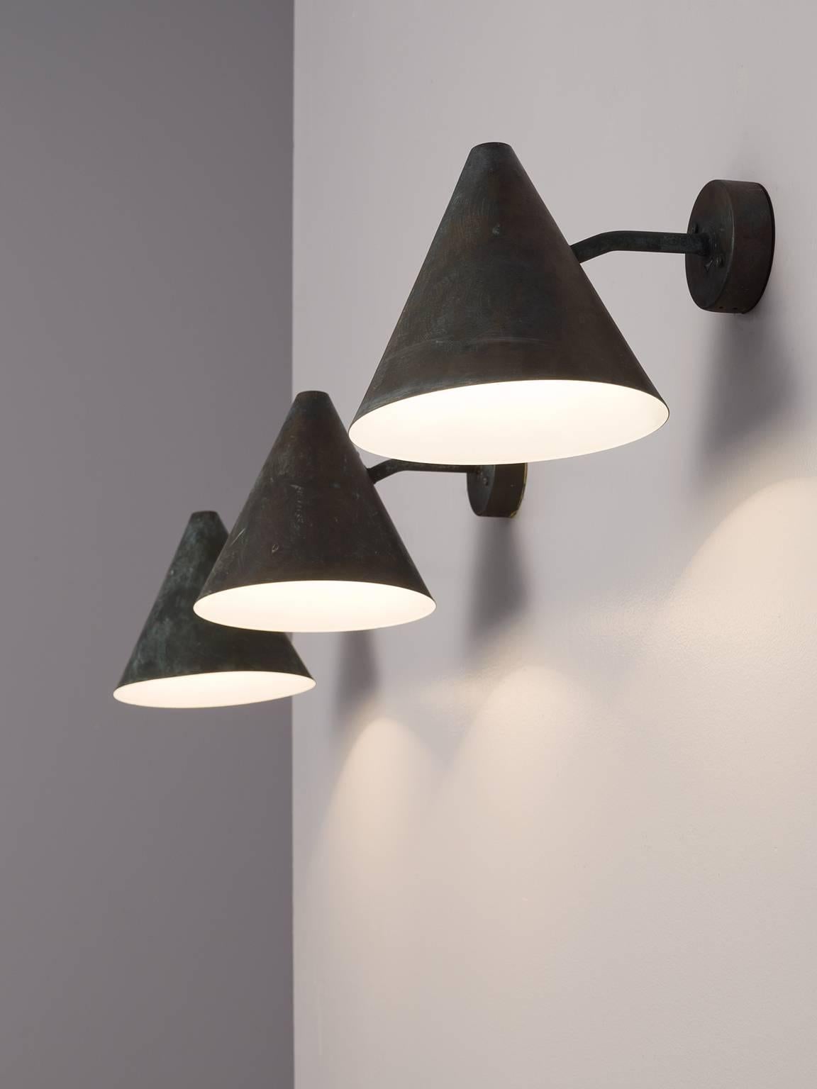 Set of nine wall lights, in copper, by Hans-Agne Jakobsson for AB Markaryd, Sweden, 1950s. 

Set of nine cone-shaped wall lights designed by Hans-Agne Jakobsson for AB Markaryd, in beautifully patinated copper with an off-white interior. The light