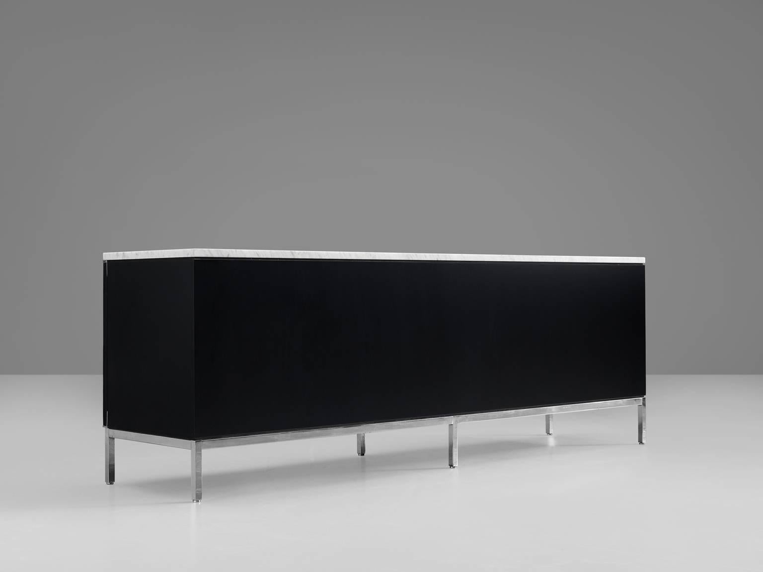 Sideboard, wood, marble and metal by Florence Knoll for Knoll International, United States, 1961. 

Iconic credenza with chromed base designed by Florence Knoll for Knoll International. This minimalistic designed credenza has modernist details,