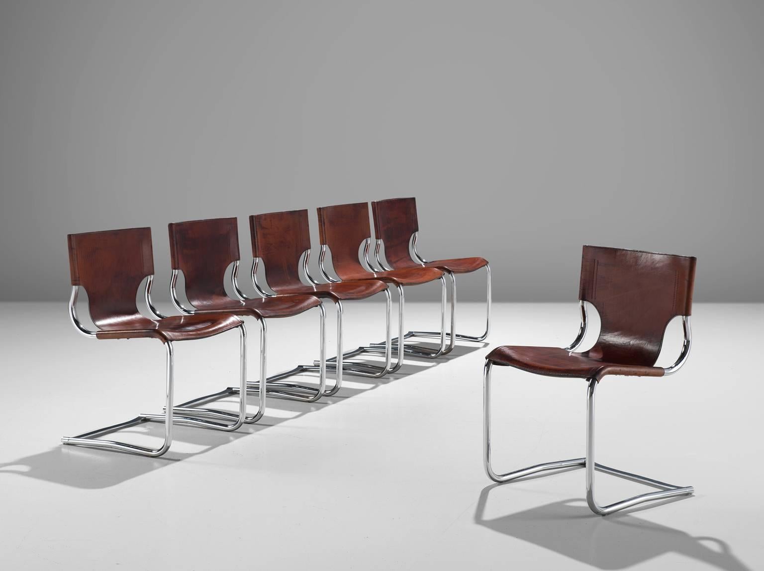 Carlo Bartoli, set of six dining chairs '920', leather and steel, Italy, 1971.

This elegant set of cantilevered tubular frame chairs are executed with the finest brown leather that is used as a shell for both seat and back. The sides of the chair