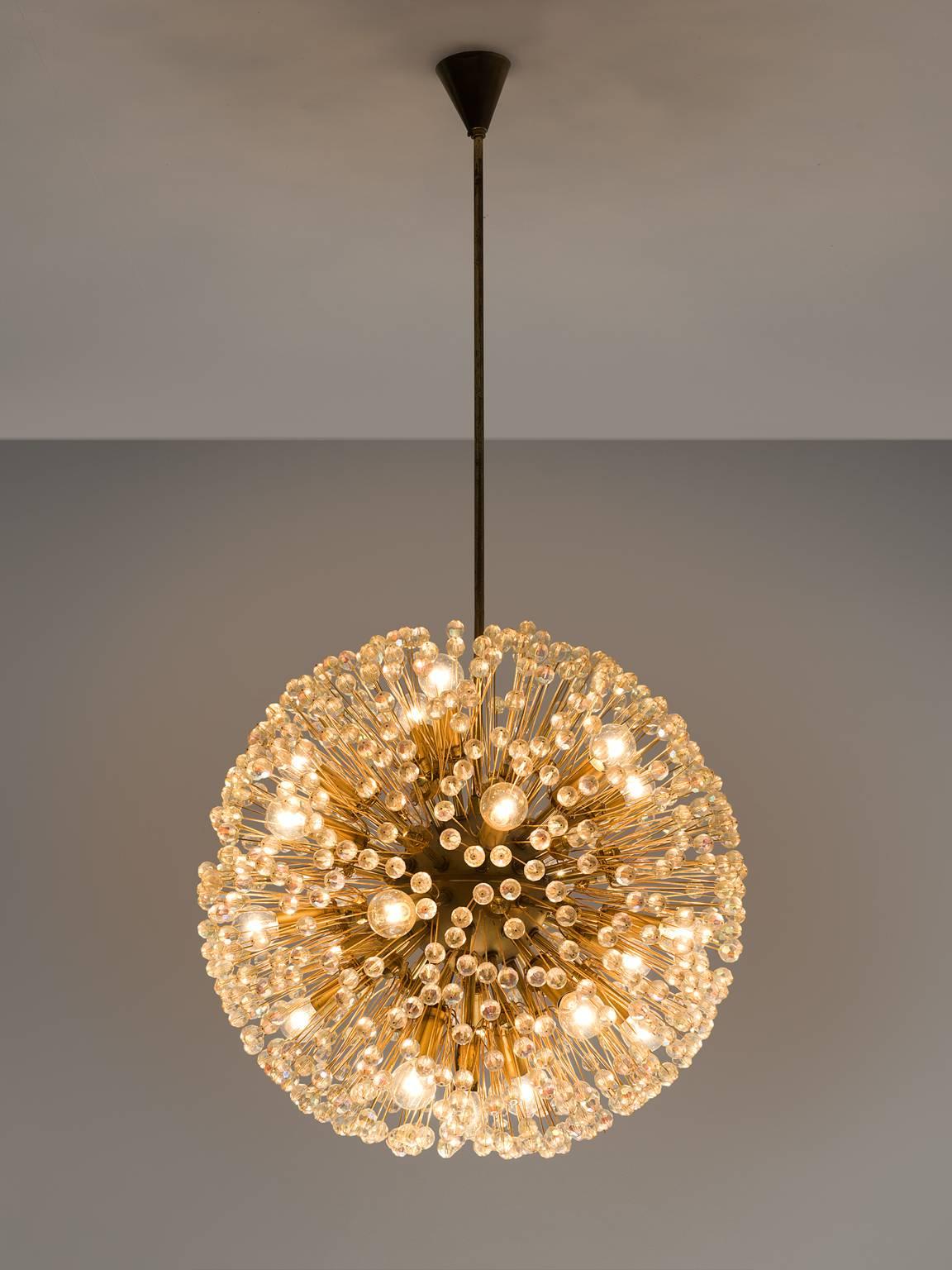 'Sputnik' chandeliers, in the style of Emil Stejnar for Rupert Nikoll, brass and glass, Austria, 1960s.

The brass sputnik shaped frame is very elegantly finished with several diamond shaped glass ornaments and faceted glass beads. The glass absorb