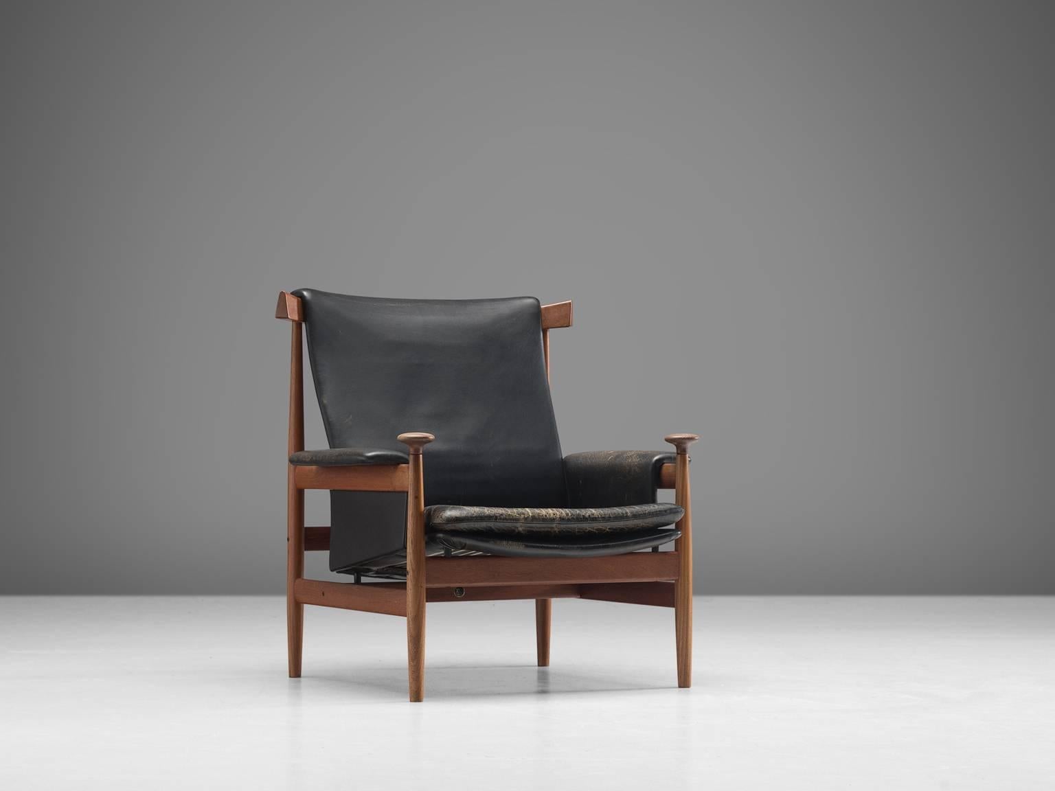 Finn Juhl for France and Son, 'Bwana' lounge chair, in teak and leather, Denmark, 1962 design, 1960s production.

This is an excellent solid teak version of Finn Juhl's 'Bwana' chair. The 