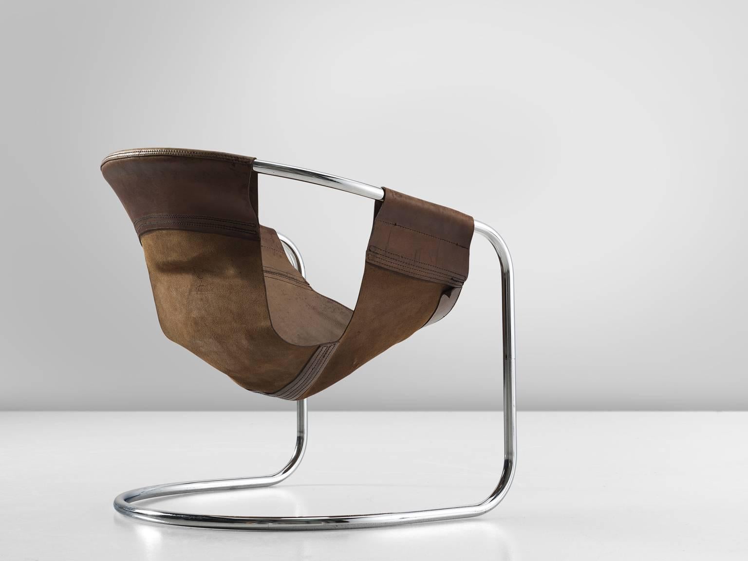 Chair, leather and chrome, 1965, The Netherlands.

This brown leather chair is both geometric and rustic in its style. The lounge chair was designed by Clemens Claessen for Ba-as Eindhoven, Holland, 1965. These chairs were made on a very small-scale