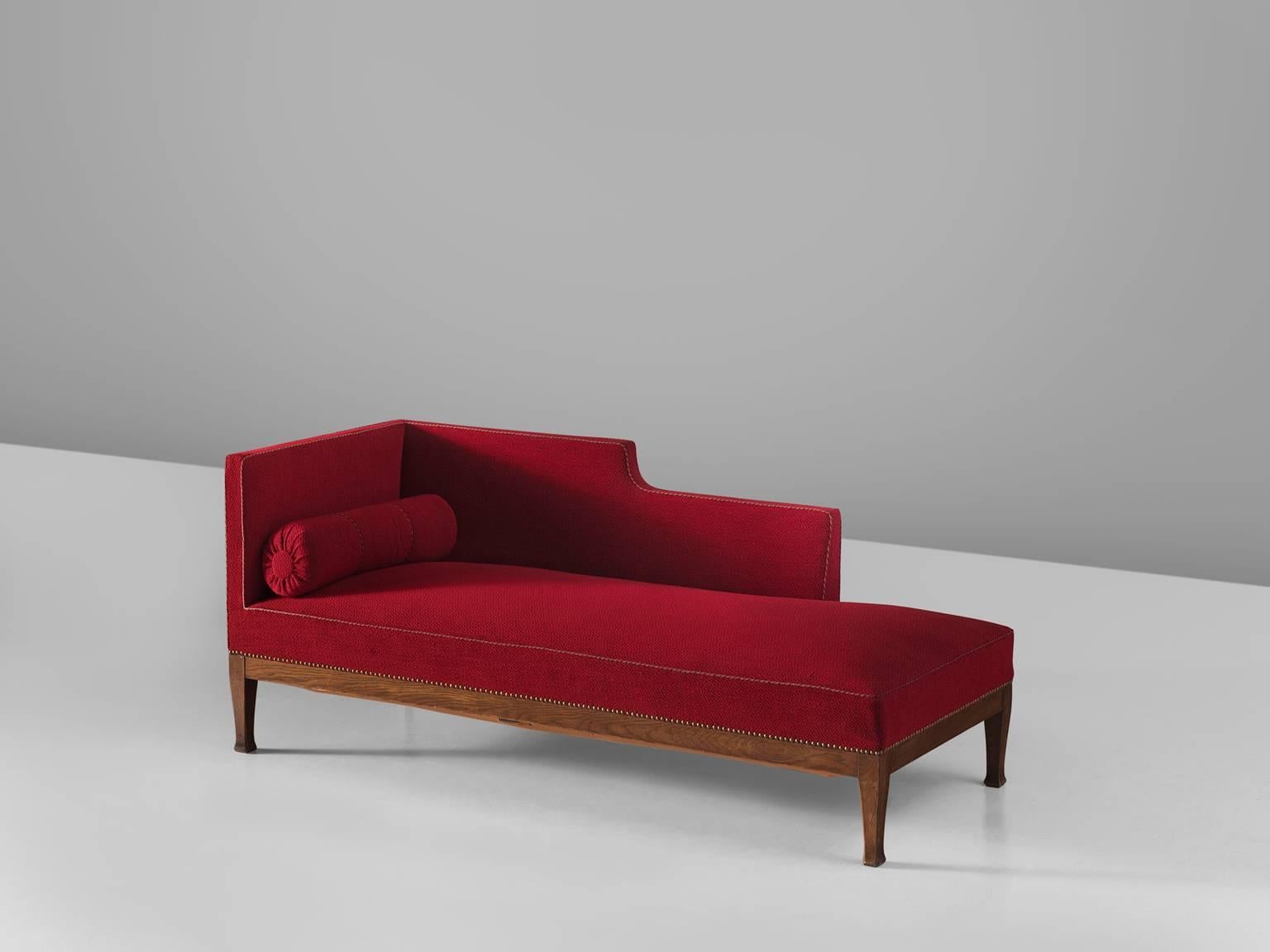 Daybed presumably by Chambert's Möbelfabrik red upholstery, oak, brass, Sweden, 1930s.

This freestanding daybed goes with the title “Swedish Grace” and features a dark polished oak frame in combination with a deep red upholstery. The daybed has a