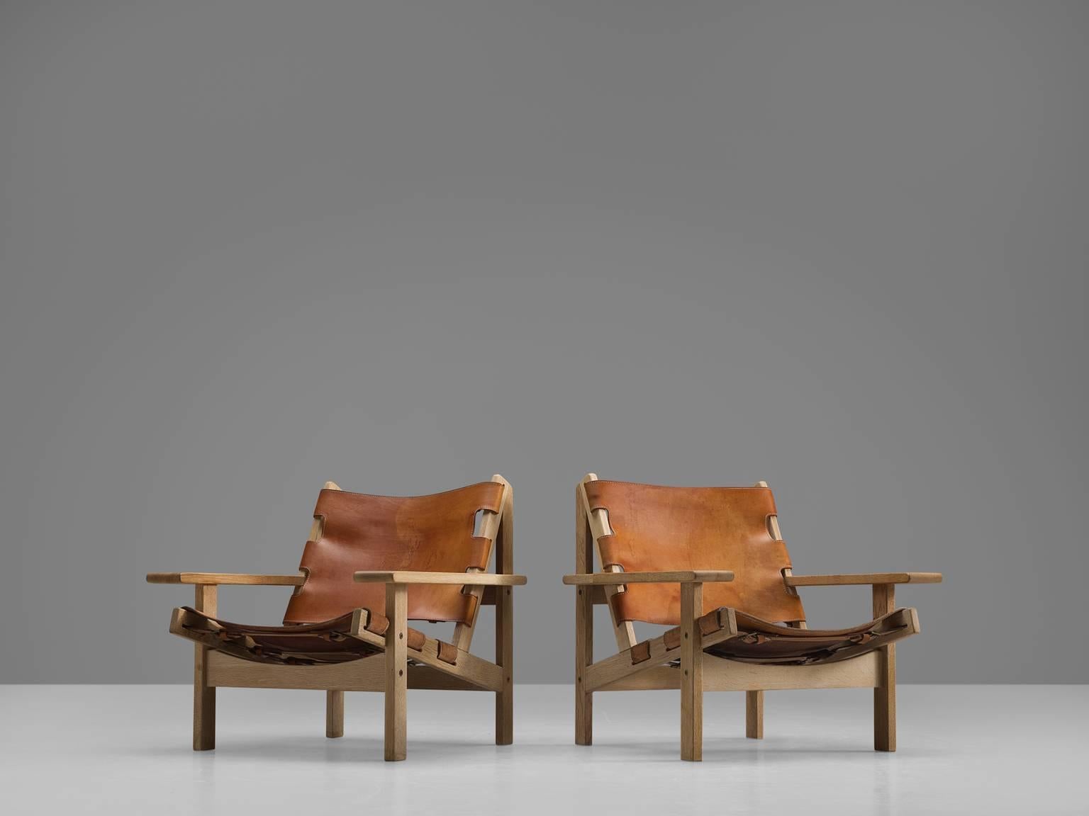 Danish Erling Jessen Set of Cognac Leather and Oak Lounge Chairs