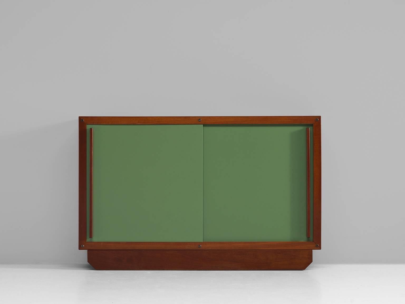 Cabinet with two sliding doors, plywood and teak, France, 1950s

Small cabinet with two doors that slide open. The design forms a playful and versatile piece of furniture resting on a sled base. Very simple clean design that is highly original. The
