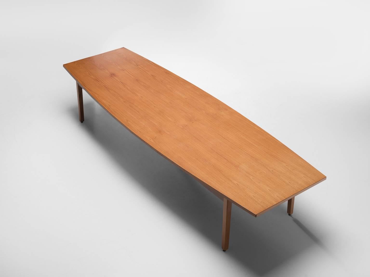 Large conference table in teak, Denmark, 1960s.

This well sized table has a boat shaped top and it made out of one-piece, it features elegantly curved sides and four slightly tapered legs. The clear shape of the top and the wonderful, modest