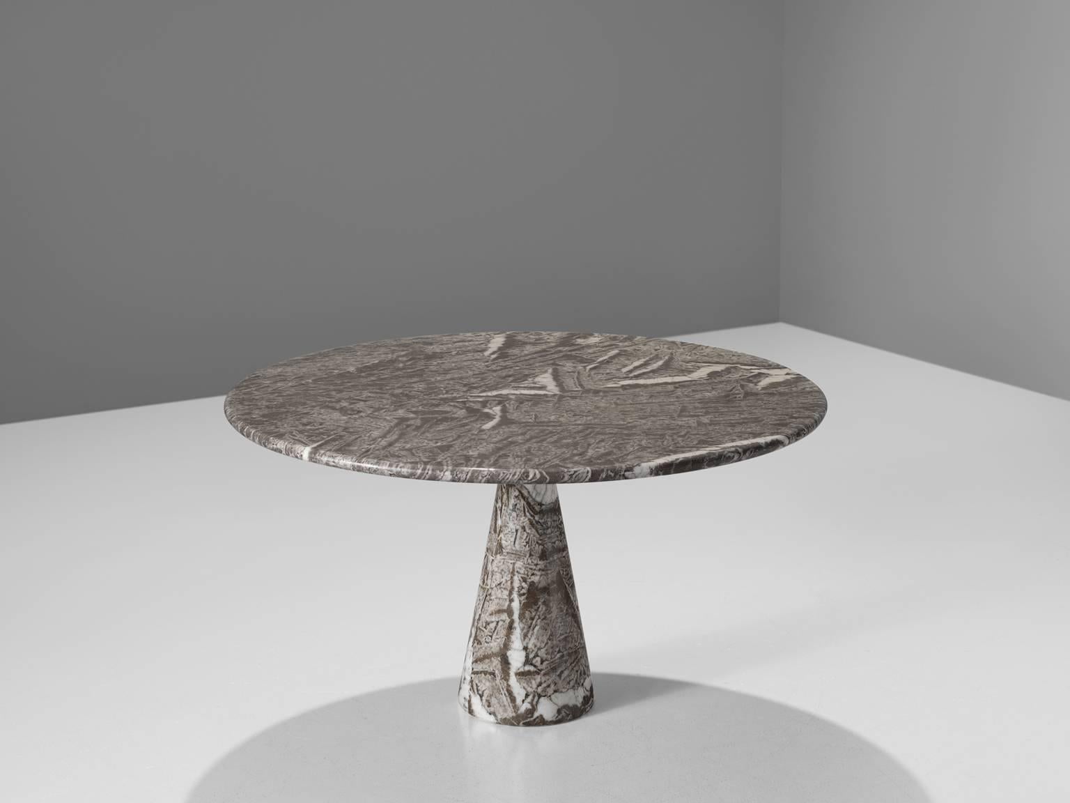Angelo Mangiarotti for T70, table M1, marble, Italy, 1969

This table is part of the Morentz midcentury collection. The patterned brown to greyish table has a cone shaped base and a circular top. The circular top rests perfectly on the cone. The