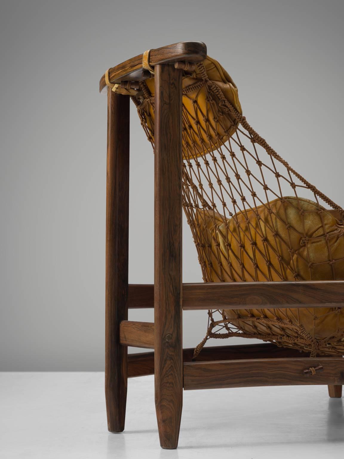 Mid-20th Century Jean Gillon 'Jangada' Brazilian Armchair and Ottoman in Original Leather