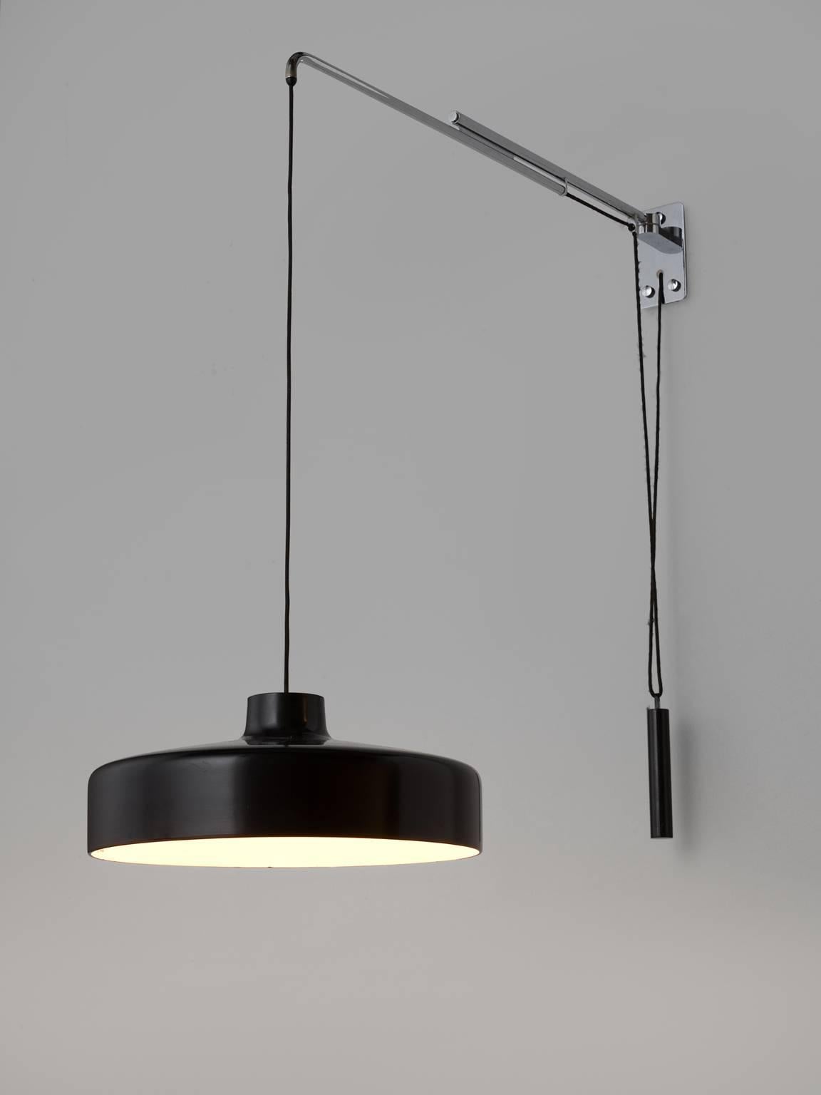 Gino Sarfatti for Arteluce, '194/N', black pendant, metal, wire, Italy, 1950.

This lamp with swivel arm features a chrome counterweight; the shade is is executed in lacquered aluminum. This exceptional pendant by Arteluce features a counterweight