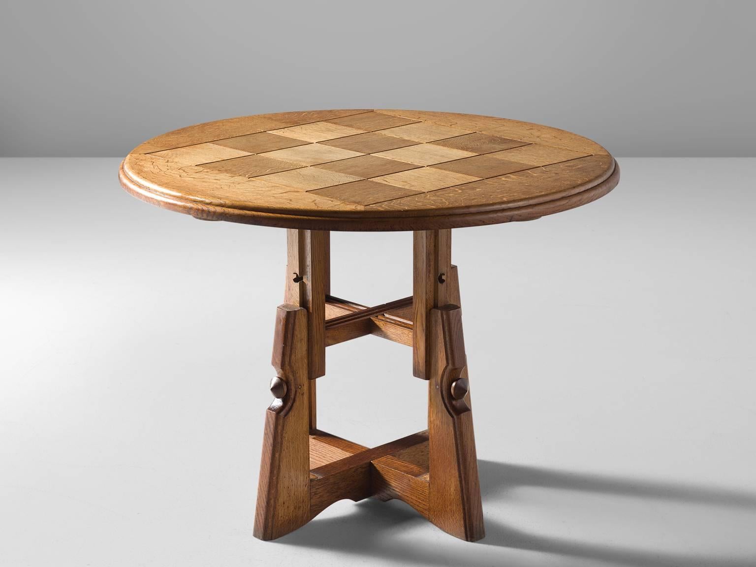 Centre table, in oak, by Guillerme et Chambron, France, 1970.

This wonderful table shows great craftsmanship and a strong appearance, that clearly characterizes the work of Guillerme and Chambron. The table is extendable in height. It can