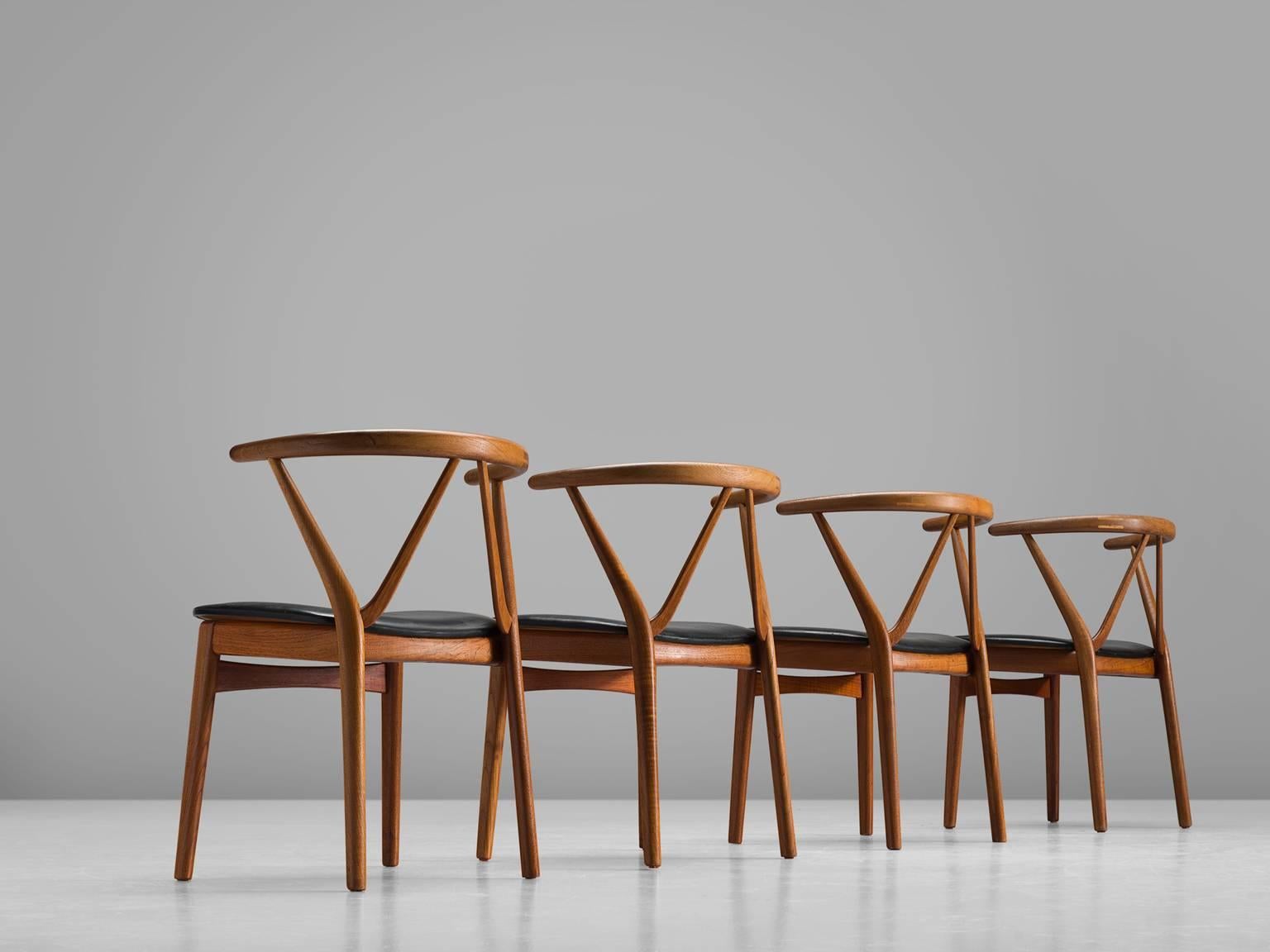 Scandinavian Modern Set of Four Henning Kjaernulf Dining Chairs in Teak and Black Upholstery