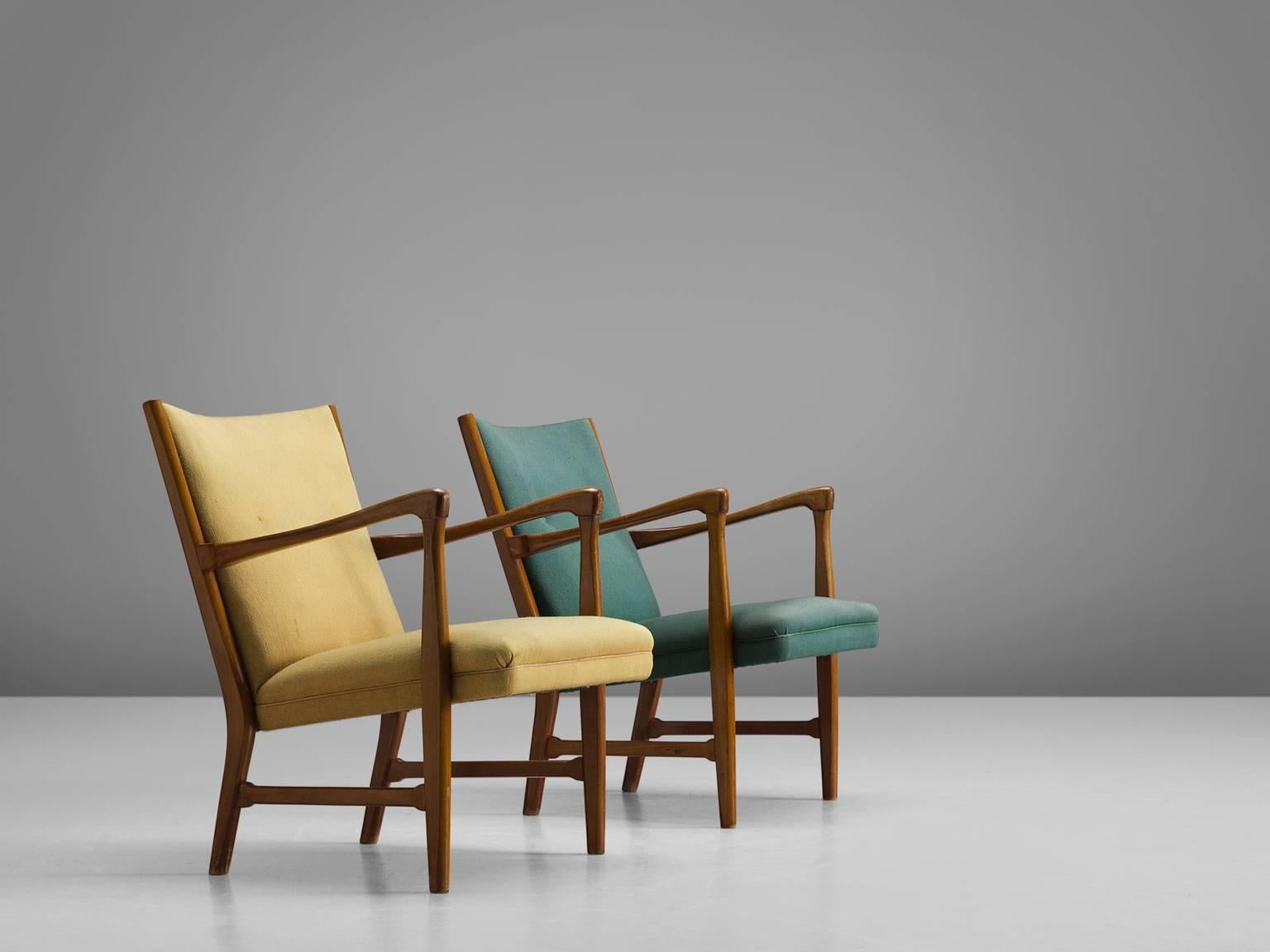 Armchairs, yellow and green fabric and wood, Denmark, 1950s.

This stately and well-executed highback chair shows an exquisite level of craftsmanship. The lines and finishes in this set are both curvy and crisp. The frame shows traits of the