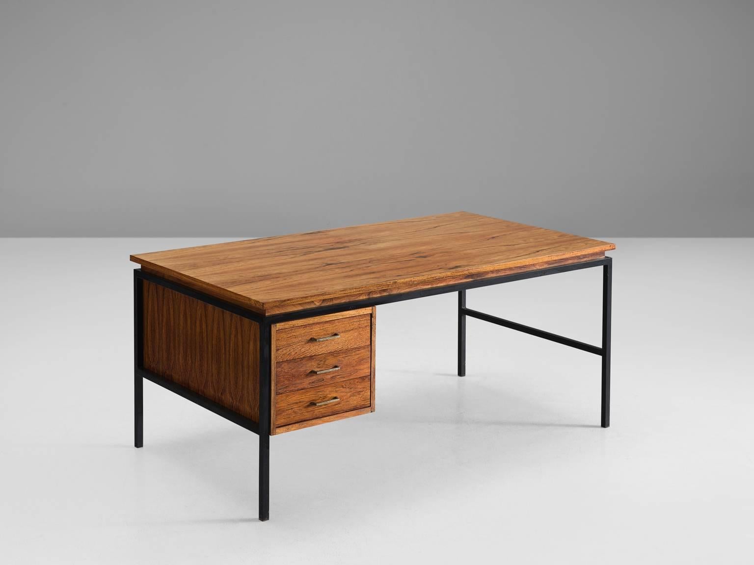 Executive desk, in rosewood and metal, Denmark, 1960s.

Freestanding desk in rosewood and black metal. This functional, minimalist and elegant writing desk is designed with high attention to detail. The steel frame is simplistic and functional.
