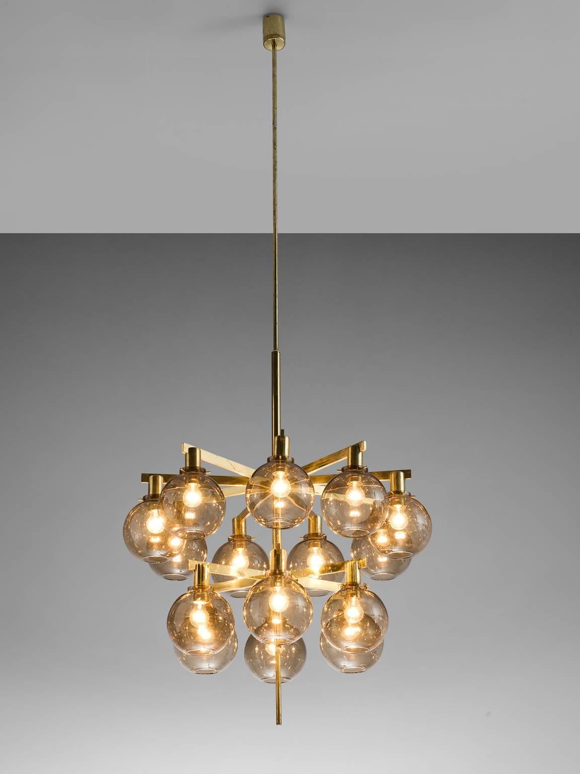 Hans-Agne Jakobsson, ceiling lamp model T-348/6 'Pastoral', brass and glass, Sweden. 

This ceiling lamp Model T348/15 'Pastoral' is designed by Hans-Agne Jakobsson. The chandelier is produced by Hans-Agne Jakobsson AB in Markaryd, Sweden. The