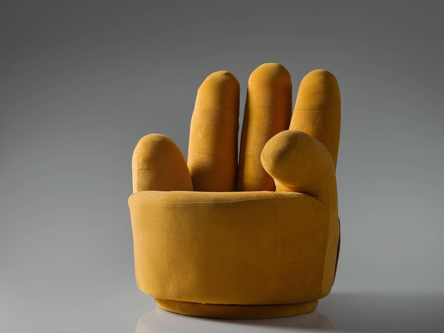 Lounge chair, fabric, Italy, 1970s

This reupholstered postmodern chair is one with a cheeky wink. It is shaped in the form of a hand and upholstered in a bright orange to yellow color. It is a typical object from the postwar age where everyday