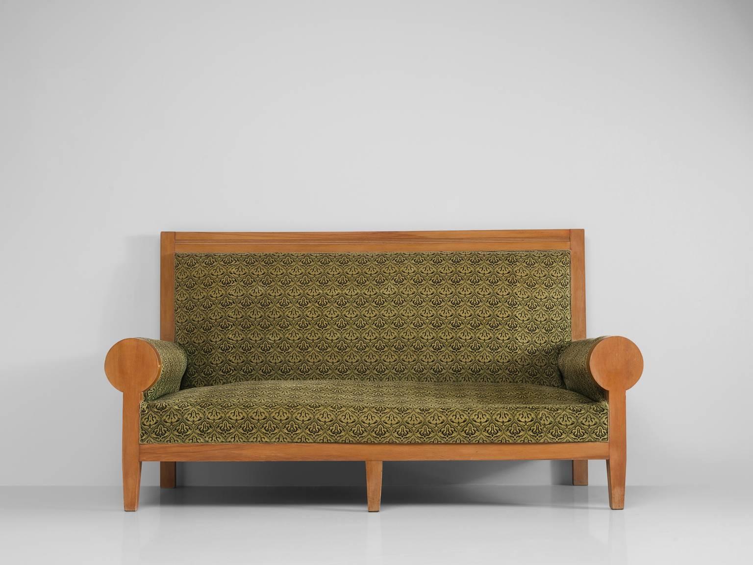 Sofa in beech and fabric, Europe, 1940s.

A stately settee in green fabric upholstery. This bench has a majestic appearance, due the high back and luxurious upholstery. The rounded armrests emphasize this royal expression. The warm colored wood