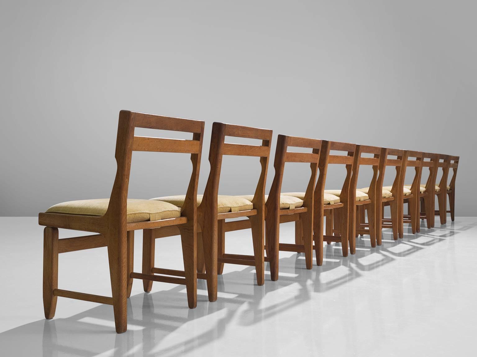 French Set of Ten Carved Oak Dining Chairs by Guillerme and Chambron