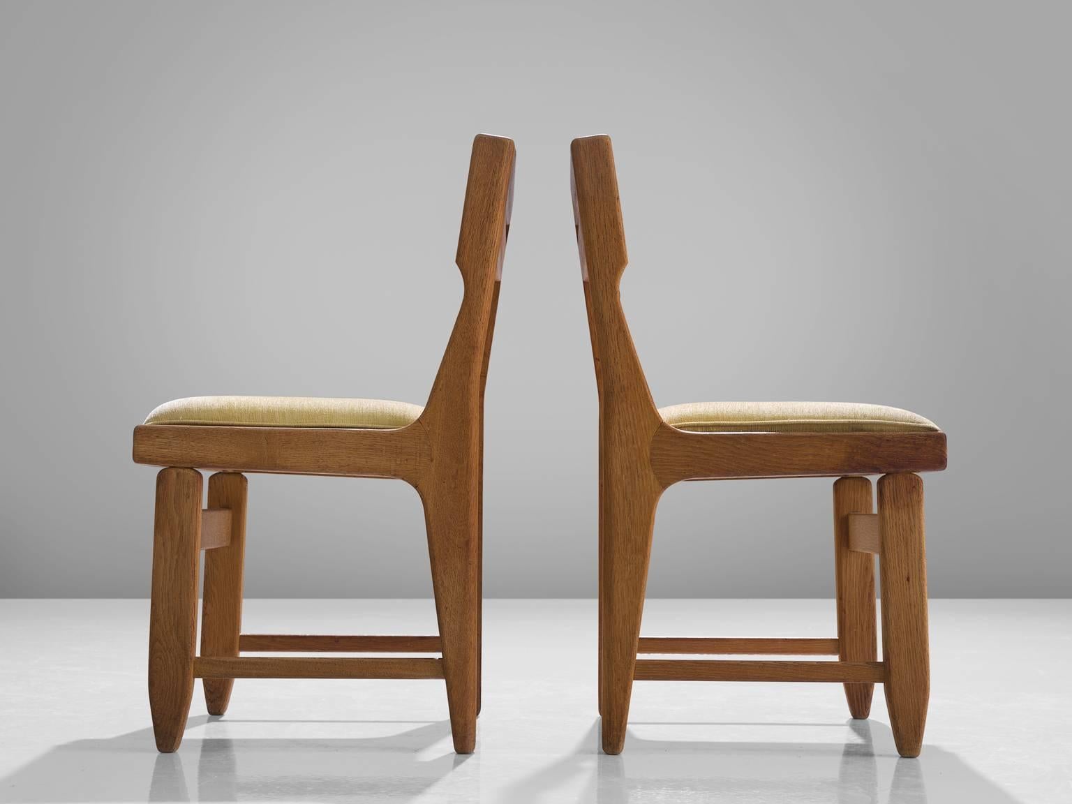 Mid-20th Century Set of Ten Carved Oak Dining Chairs by Guillerme and Chambron