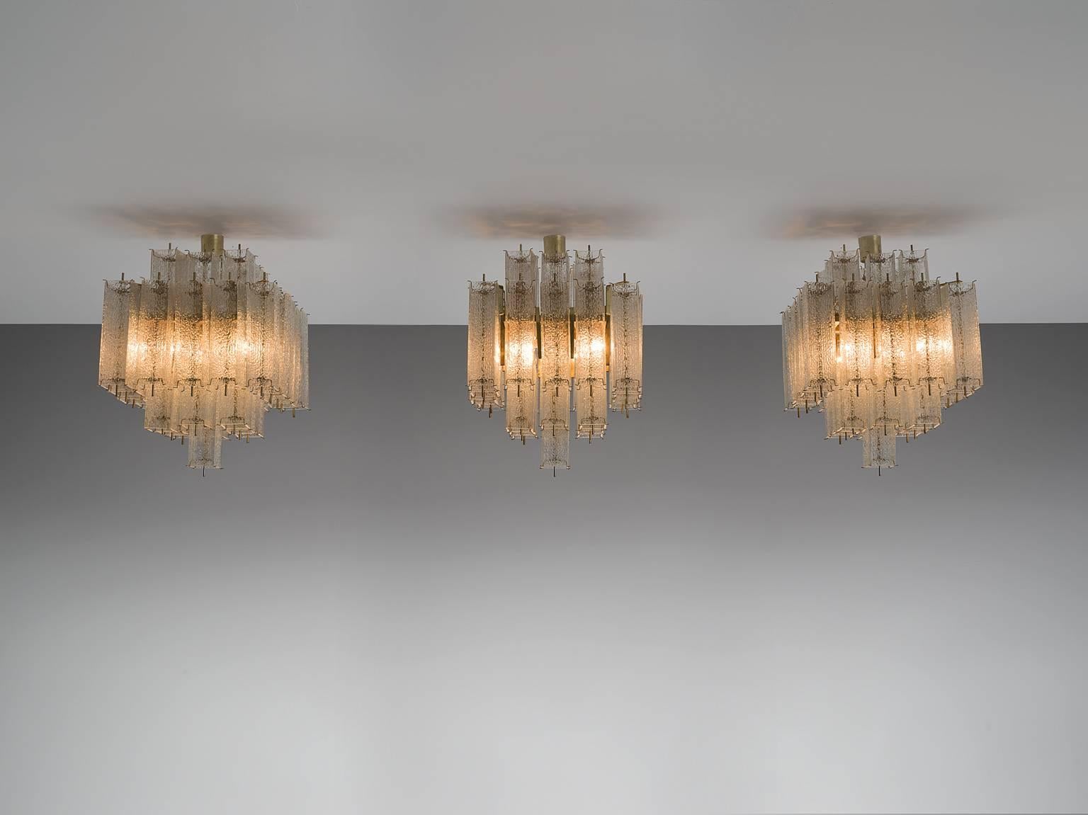 Late 20th Century Set of Three Layered Brass and Structured Glass Chandeliers