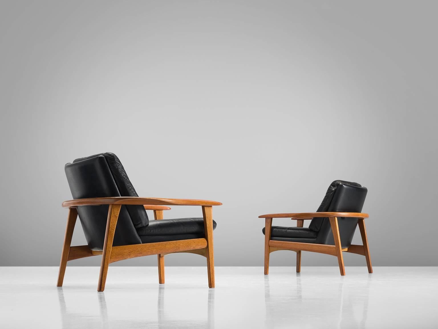 Mid-20th Century Danish Pair of Original Black Leather Teak Lounge Chairs