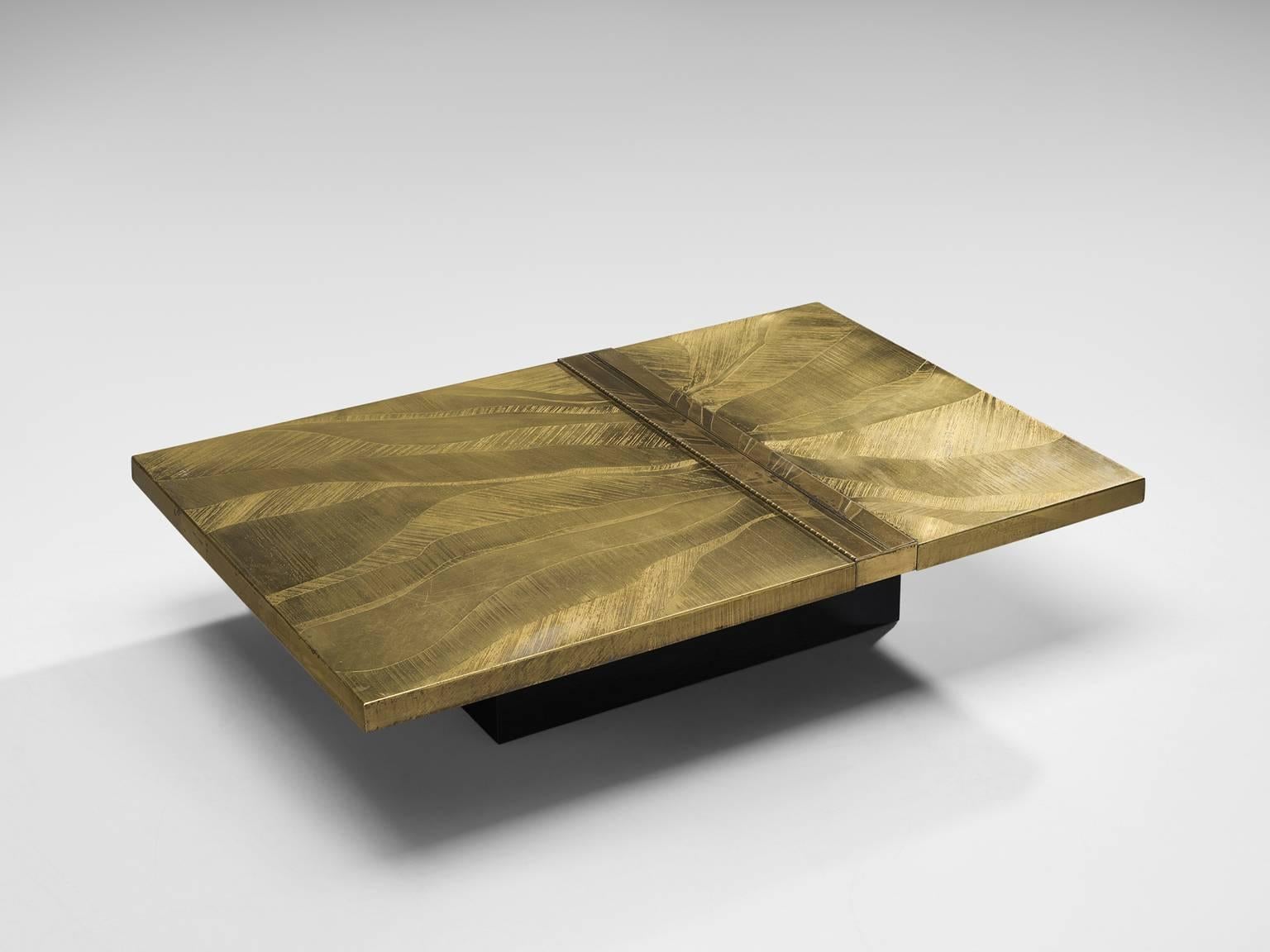Christian Krekels, coffee table, brass and enameled steel, Belgium, circa 1970.

This rectangular sculptural coffee table was probably a private commission, as this table is very luxurious and refined. The technique that is used is acid etching in