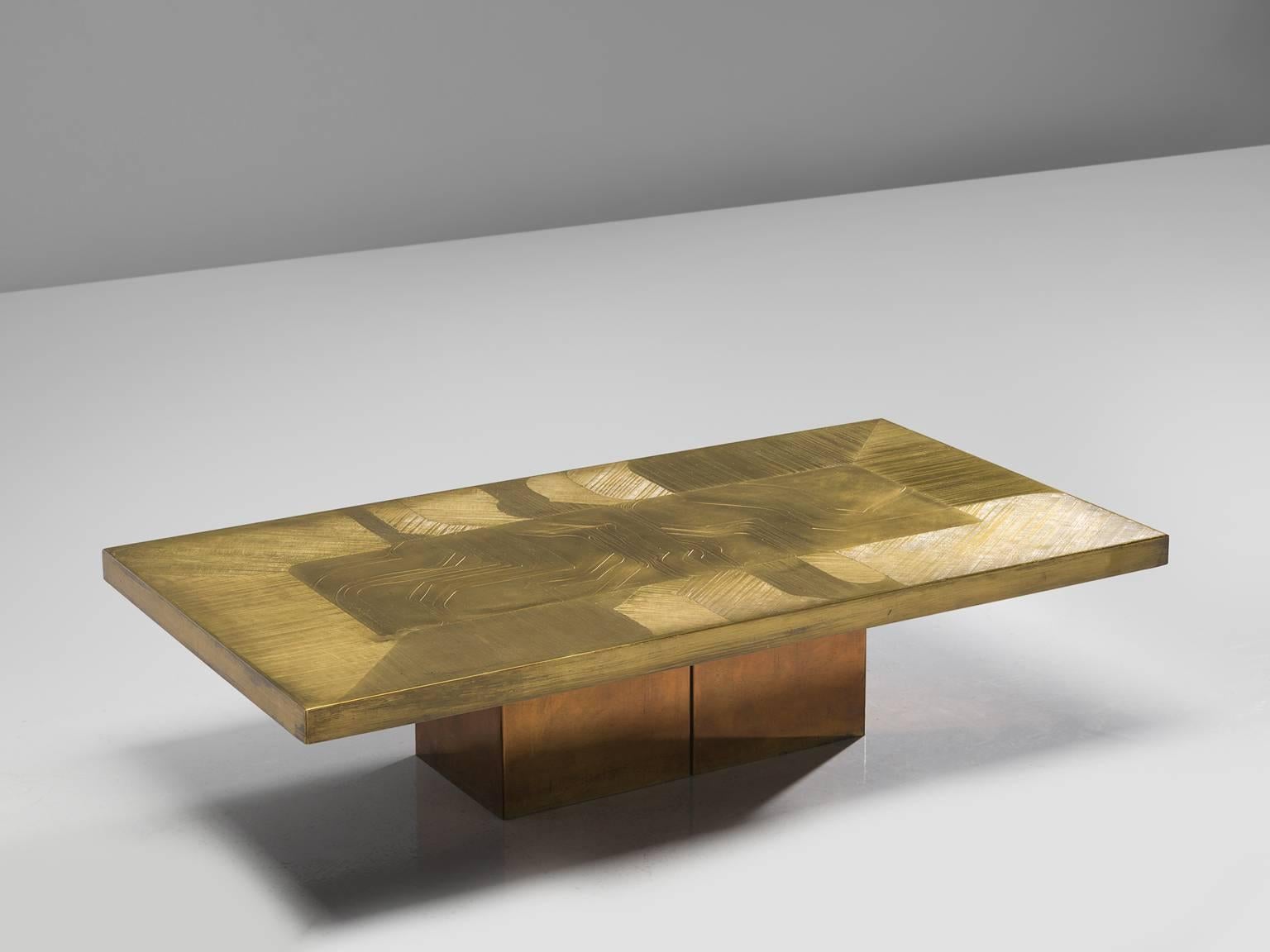 Jenatzy coffee table in brass and copper, Belgium, circa 1980.

This rectangular sculptural coffee table was probably a private commission, as this table is very luxurious and refined. The technique that is used is acid etching in order to create a