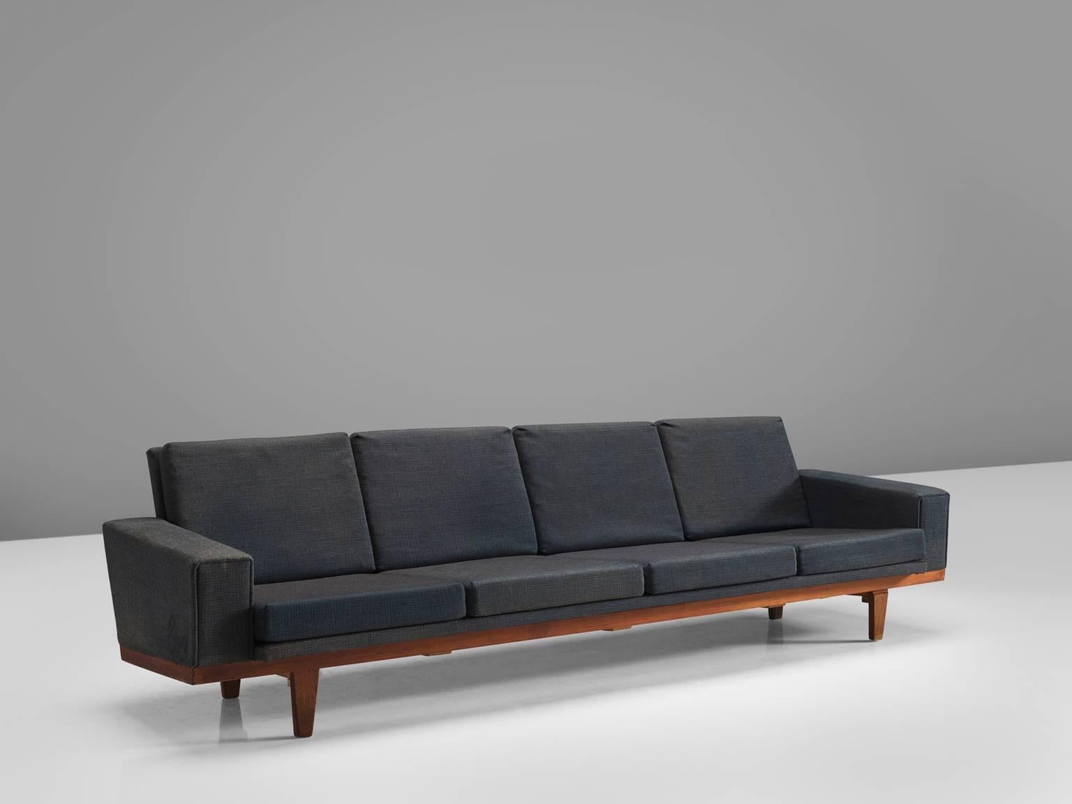 Sofa, grey blue fabric, teak, Denmark, 1960s

This sofa is executed in with thick grey blue fabric. The seat and back are both smoothly upholstered and complement the teak frame wonderfully. The legs slightly tapered and sturdy and flat. The sofa