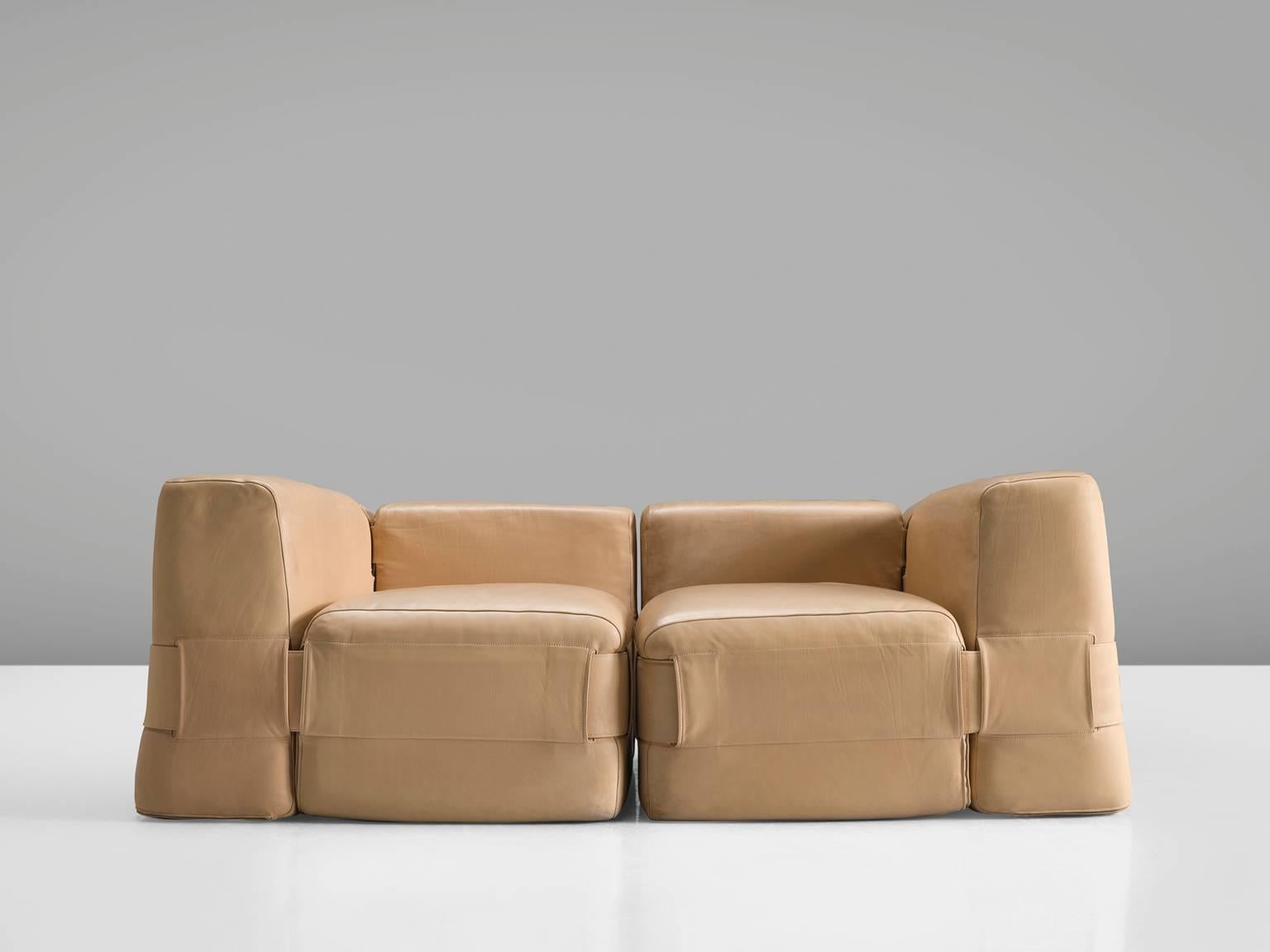 Mario Bellini for Cassina, sofa model 932, cognac leather, Italy, 1964.

Mario Bellini designed this modular sofa for Cassina. The sofa is a reinterpretation of Classic furniture that always uses padded cushions. He experimented with these cushions