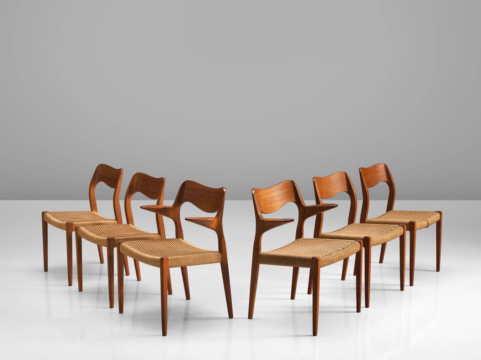 Niels O. Møller, armchairs model 55 and four dining chairs model 71, teak and cane, Denmark, 1950s.

These chairs designed by Niels Møller show subtle lines and beautiful curves of the woodwork. Two of the chairs feature short, pointy armrests