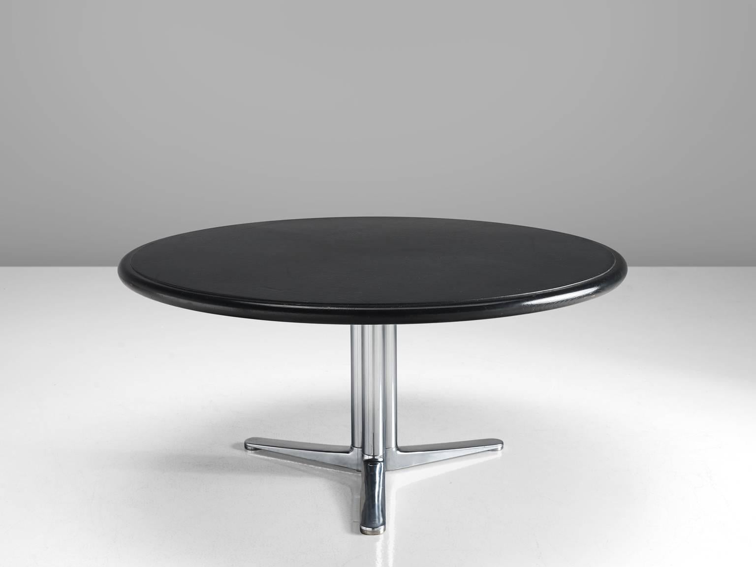 Warren Platner for Knoll International, dining table, in wood, black leather and steel, United States, 1960s.

This heavy, sturdy table is designed by the American modernist Warren Platner. He is most known for his airy metal, sculptural lounge