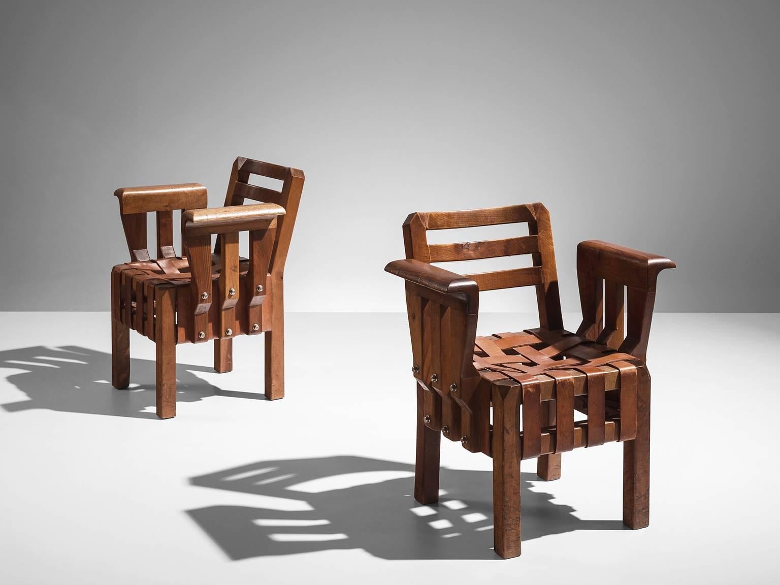 Curro Inza, set of armchairs, elm and cognac leather, Spain, 1950s.

It is hard to describe the sculptural and architectural splendor that is combined within these chairs. They are bold, structurally sound and anything but ostentatious. Moreover,