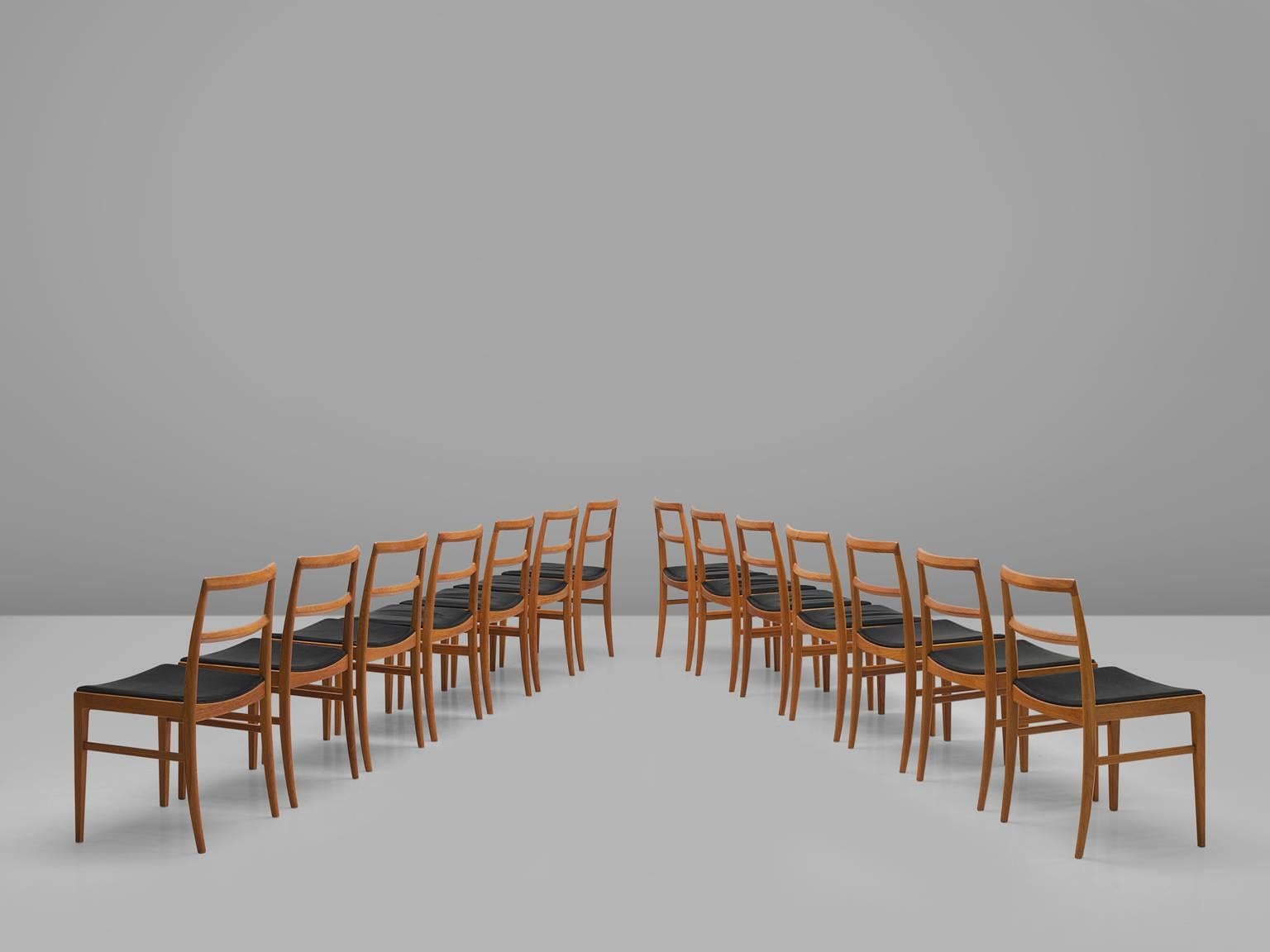 Arne Vodder for Sibast Møbler, set of fourteen '430' dining chairs, teak and leather, by Denmark, 1960s. 

This large set of fourteen chairs is designed by the Danish designer Arne Vodder. The basic and linear design gives these chairs a feel of