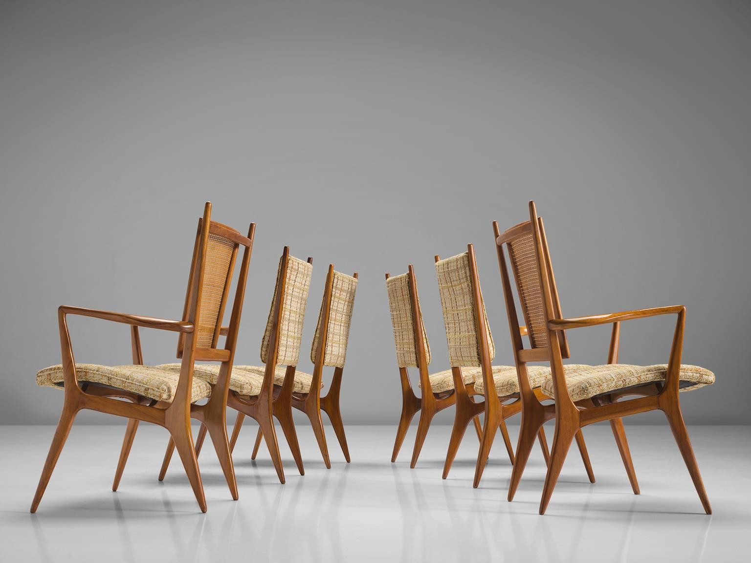 Vladimir Kagan, set of six chairs of which two with armrests, walnut, cane, fabric, United States, circa 1955.

This set of dining chairs is designed by Vladimir Kagan for Hugo Dreyfuss. The set of six chairs is sensuous, sculptural and elegant.