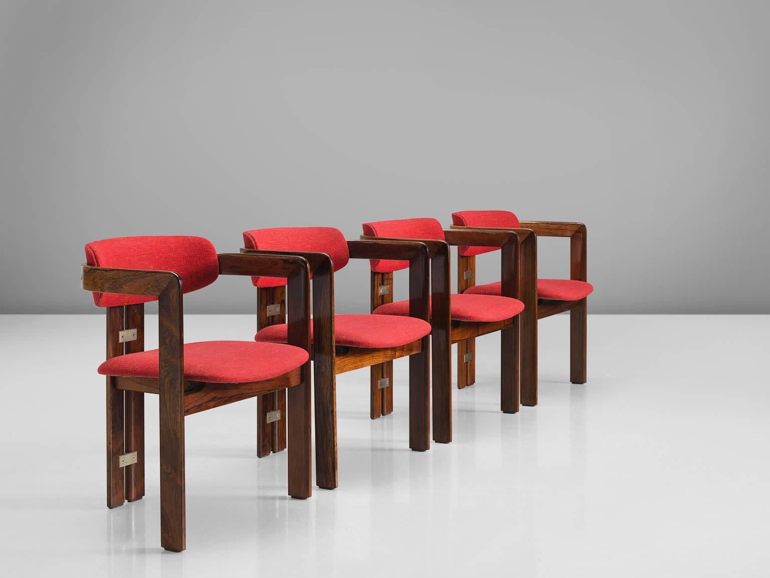 Augusto Savini for Pozzi, red fabric, rosewood, set of four ‘Pamplona’ armchairs, Italy, 1960s.

This set of four Italian chairs are part of the midcentury design collection. The basic design of these armchairs creates a strong expression. The