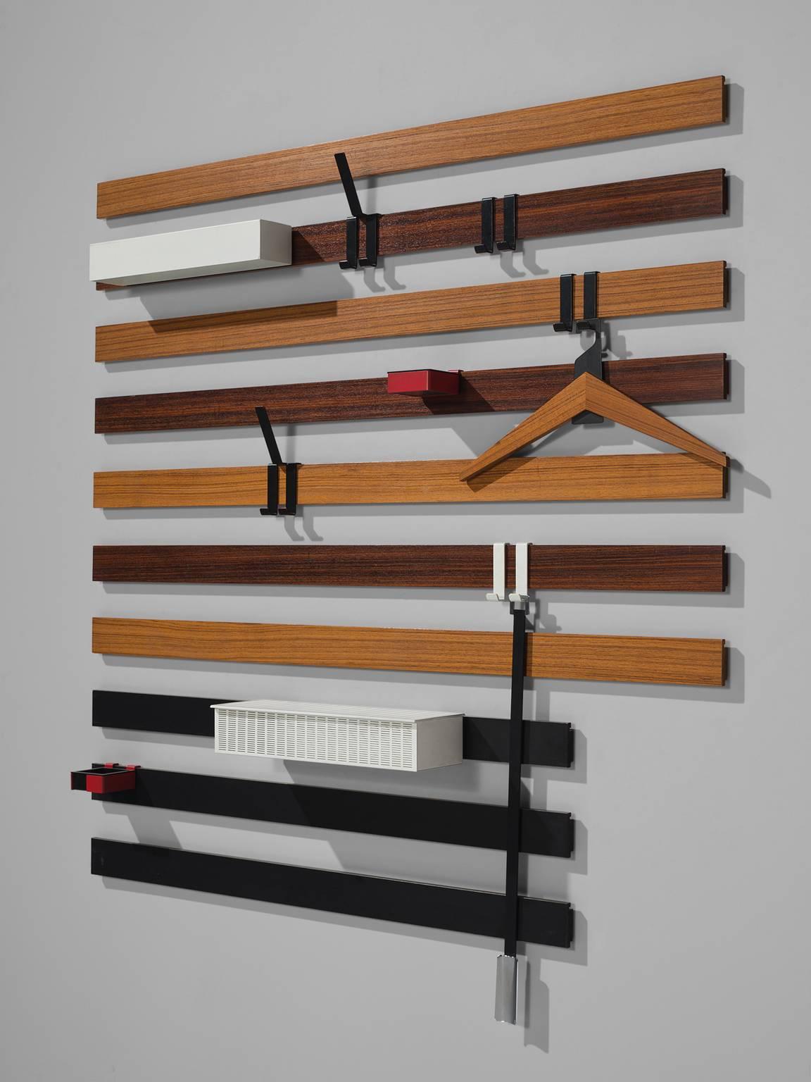 Rudolf Rochelt, coat rack, wood, metal, Germany, 1963.

This coat rack is designed by Rudolf Rochelt for Werkstätten and is part of the midcentury design collection. This minimalist, functional yet very aesthetic wall unit takes up very little space