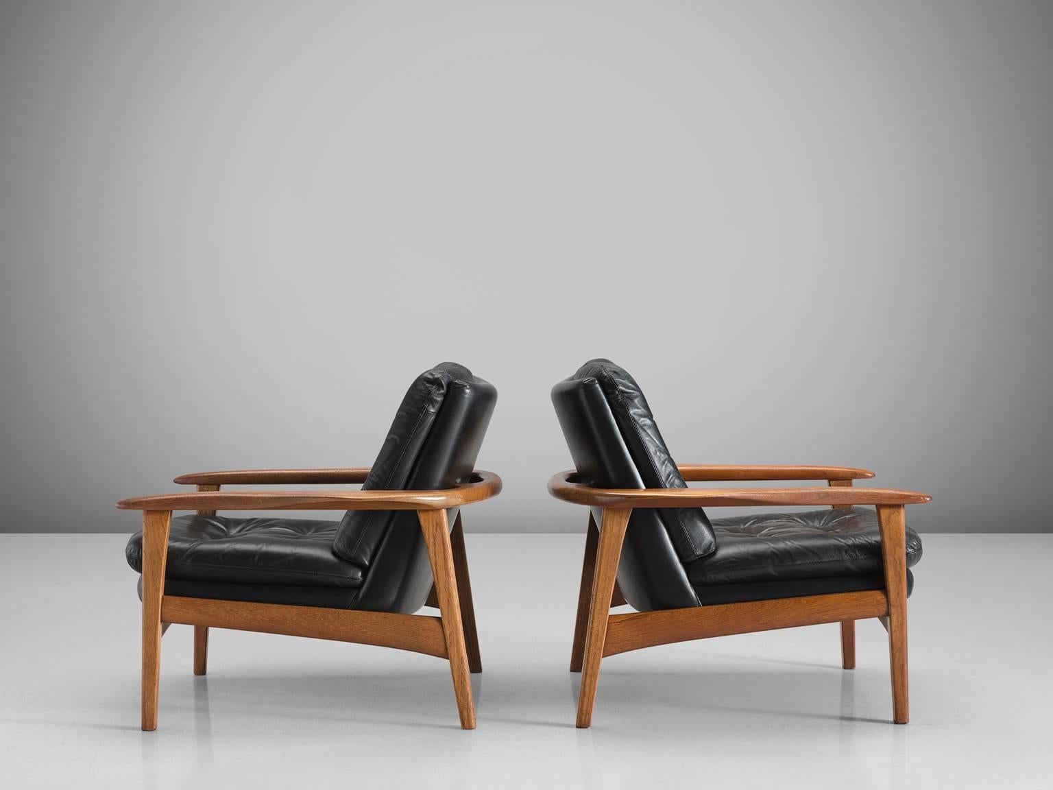 Mid-20th Century Danish Pair of Original Black Leather Teak Lounge Chairs