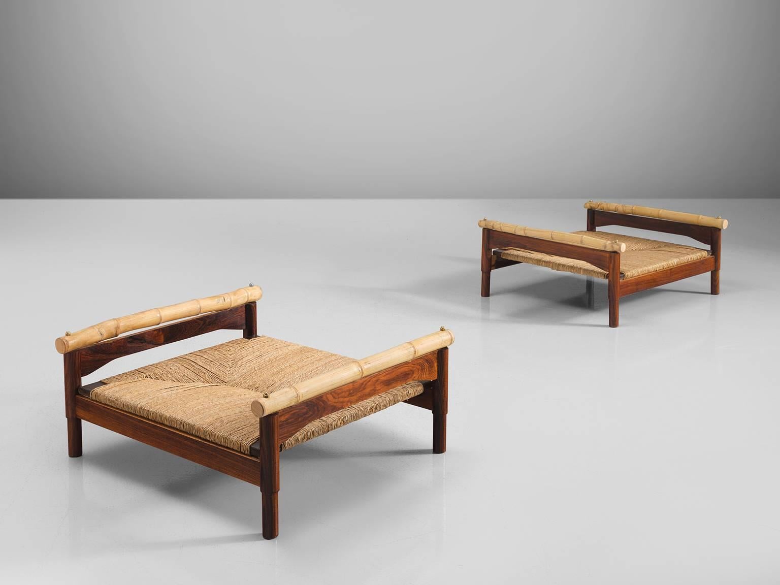 Benches or stools, rosewood, cane, bamboo, Italy, 1960s.

These midcentury stools are made of rosewood, cane and bamboo are very sculptural and robust. Their design is as such that it is very low to the ground. The materials are warm and natural and