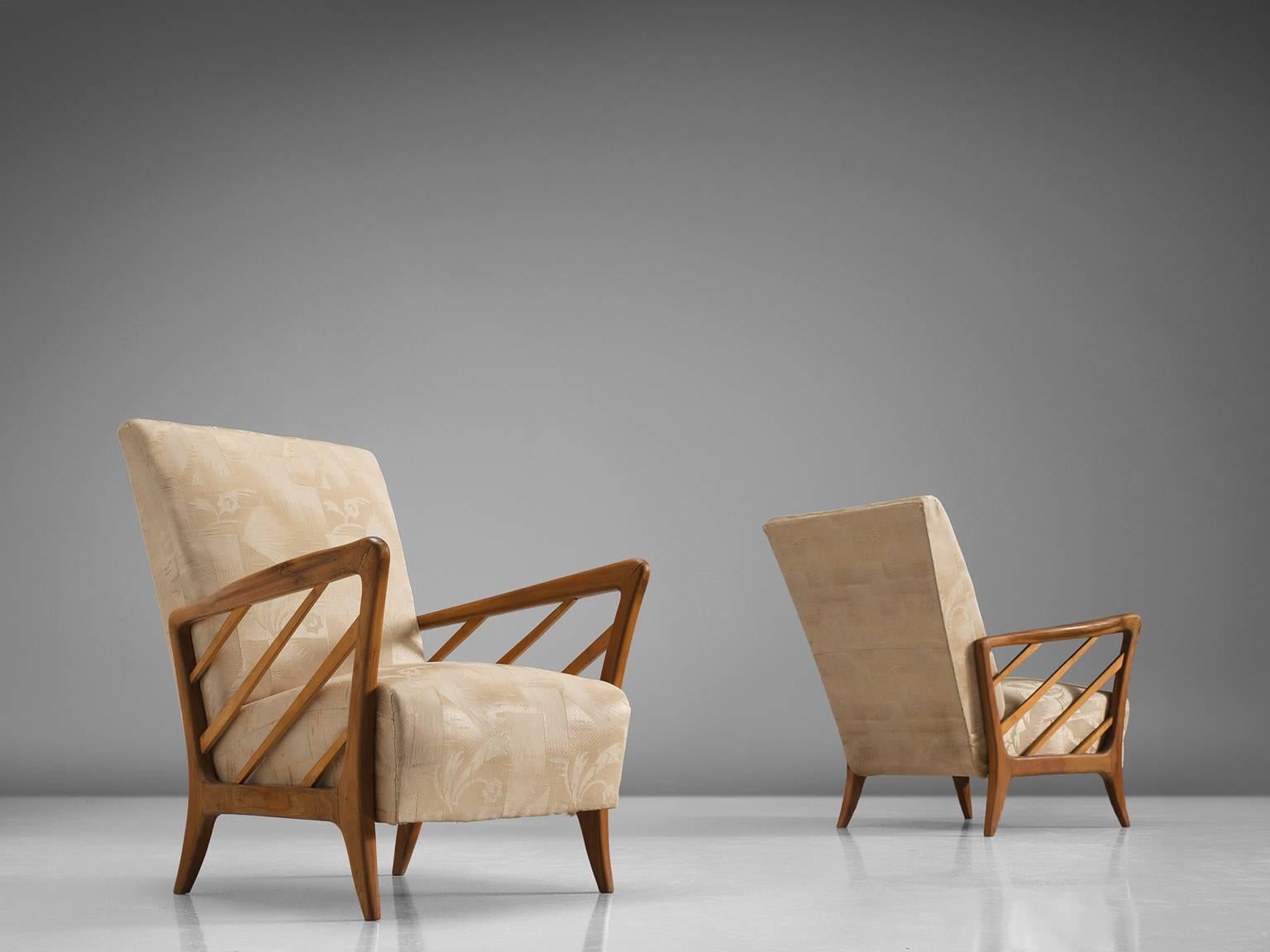 Paolo Buffa style chairs, Italian walnut and floral beige fabric, 1960s, Italy.

This poetic armchairs are made in the style of Paolo Buffa (1903-1970). The most distinctive feature within these armchairs are the armrests that have slats. The